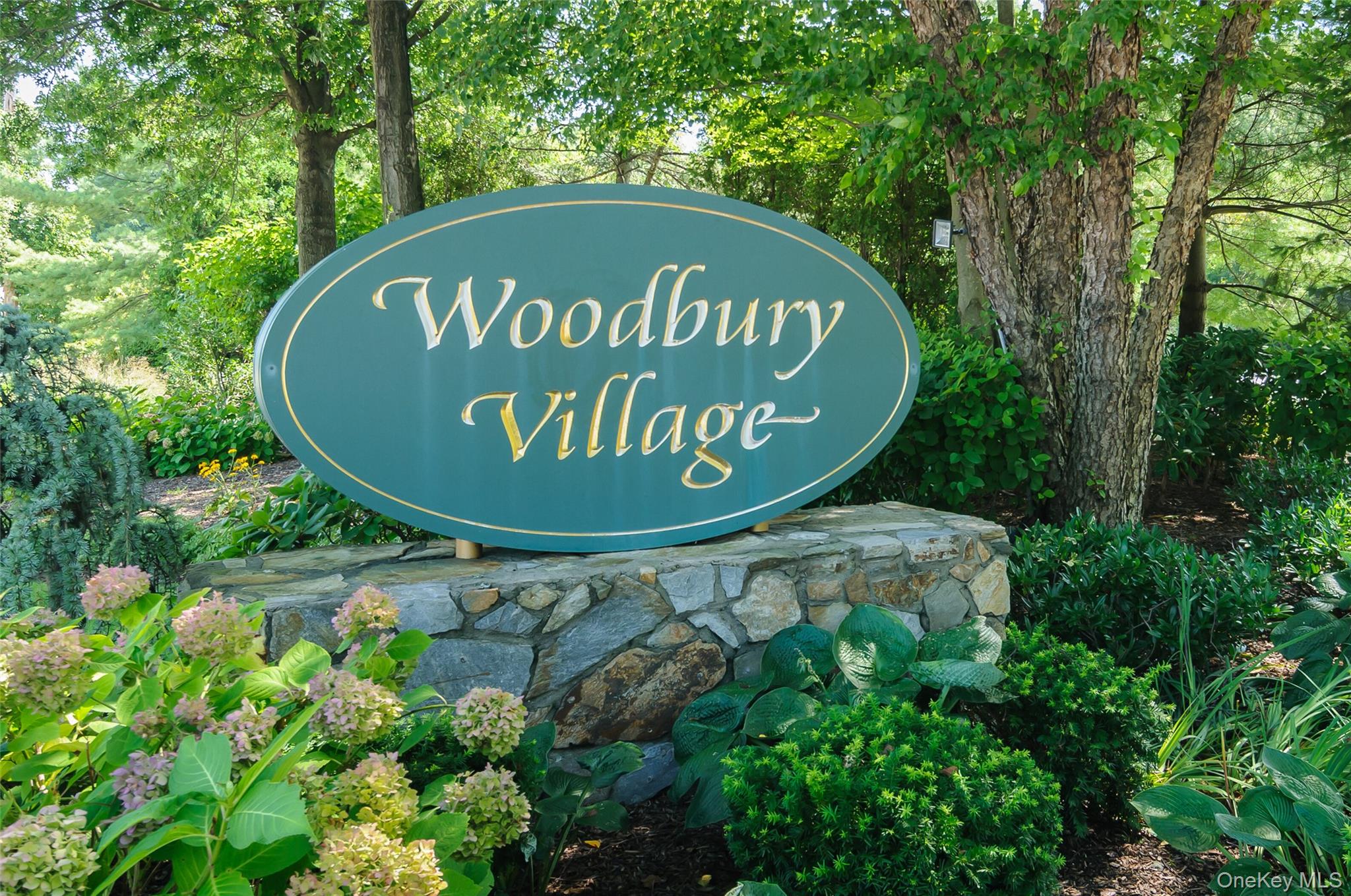 Enjoy a country club lifestyle in the desirable Woodbury Village Community with Syosset Schools offering an outdoor pool, tennis, pickleball courts & playground! Move-In Ready, this spacious 2â€“3 bedroom, 2.5 bath townhouse features an eat in granite kitchen with stainless steel appliances, bay window, vaulted ceilings & skylights. A sun-drenched L-shaped living/dining room with wood-burning fireplace has sliders that open onto the lovely brick patio for outdoor entertaining. The primary suite includes a private bath & walk-in closet. The open loft/office can easily be converted into a third bedroom & shares the large hall bath. Ample closets, guest half bath on first floor & laundry in the unit complete this perfect home. Conveniently located near shopping, dining, LIRR, and hiking trails!