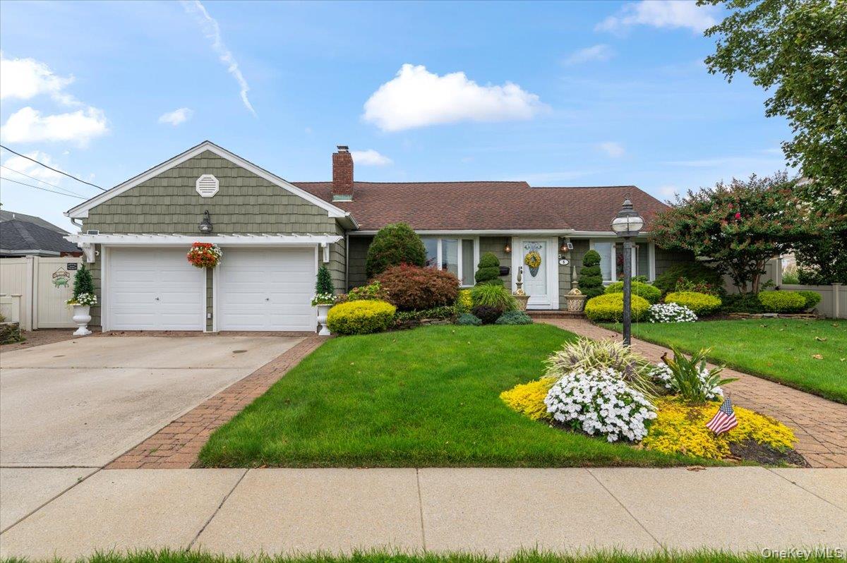 Waterfront Living in Massapequa Welcome to this two-bedroom waterfront retreatâ€”an entertainerâ€™s dream filled with natural light and stunning details throughout. The open-concept kitchen flows seamlessly into the living spaces, perfect for hosting gatherings large or small.This home offers two gas fireplaces, custom moldings, and porcelain tile floors with radiant heat, combining comfort with elegance. Three skylights brighten the home, while trex decking invites you to enjoy outdoor living with breathtaking water views and a private enclosed spa pool.Enjoy peace of mind with a 6-year-old roof, gas heating & cooking, and a 10-year-old bulkhead. The property spans 80x100 and features a serene koi pond, creating a true backyard oasis.With its unbeatable combination of modern updates, waterfront lifestyle, and timeless charm, this home is ready for you to move right in.