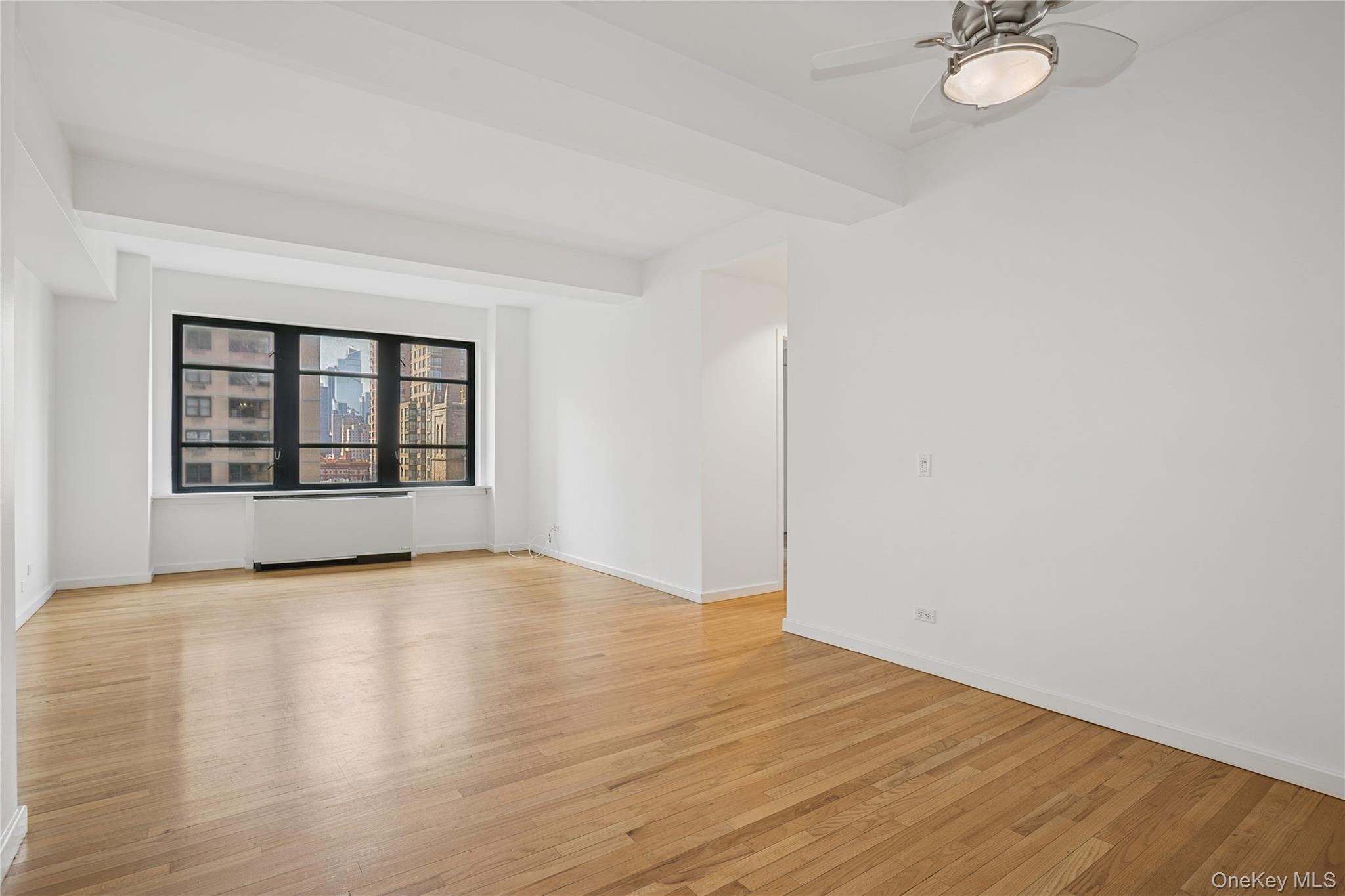 Discover an exceptional two-bedroom, two-bathroom condominium in the iconic Art Deco Sofia building at 43 W 61st Street. Spanning 1, 180 sq ft, this high floor corner unit dazzles with sun-drenched southâ€“west light and expansive city views.Step into the open, updated kitchen featuring a chic breakfast bar, perfect for casual dining or entertaining. The homeâ€™s hardwood floors flow throughout, unified by the comfort of central air and enhanced by ample closet space.Designed for modern living within a historic context, this residence enjoys the benefits of a full-service building with 24-hour doorman and concierge, a live-in superintendent, and laundry facilities on every floor. Bike storage and pet-friendliness round out the thoughtful amenities.Ideally located just steps away from Lincoln Center, Central Park, and top-tier shopping and dining at the Time Warner Center, this offering marries cultural richness with sophisticated living. 43 West 61st Street (The Sofia) is a premier full-service condominium blending classic Art Deco architecture with modern luxury living. Originally built in the 1930s as the first elevated parking facility and converted to condominiums in the 1980s, this iconic residence is known for its striking limestone fa&#231;ade, elegant design, and timeless presence on the Upper West Side.Offered now at a price reflecting its timeless craftsmanship and desirable locationâ€”great value and an opportunity not to be missed.Mortgage Assessment: $238.79Capital Assessment: $142.81Taxes represented reflect eligibility for the Co-op Condo Abatement for primary resident.