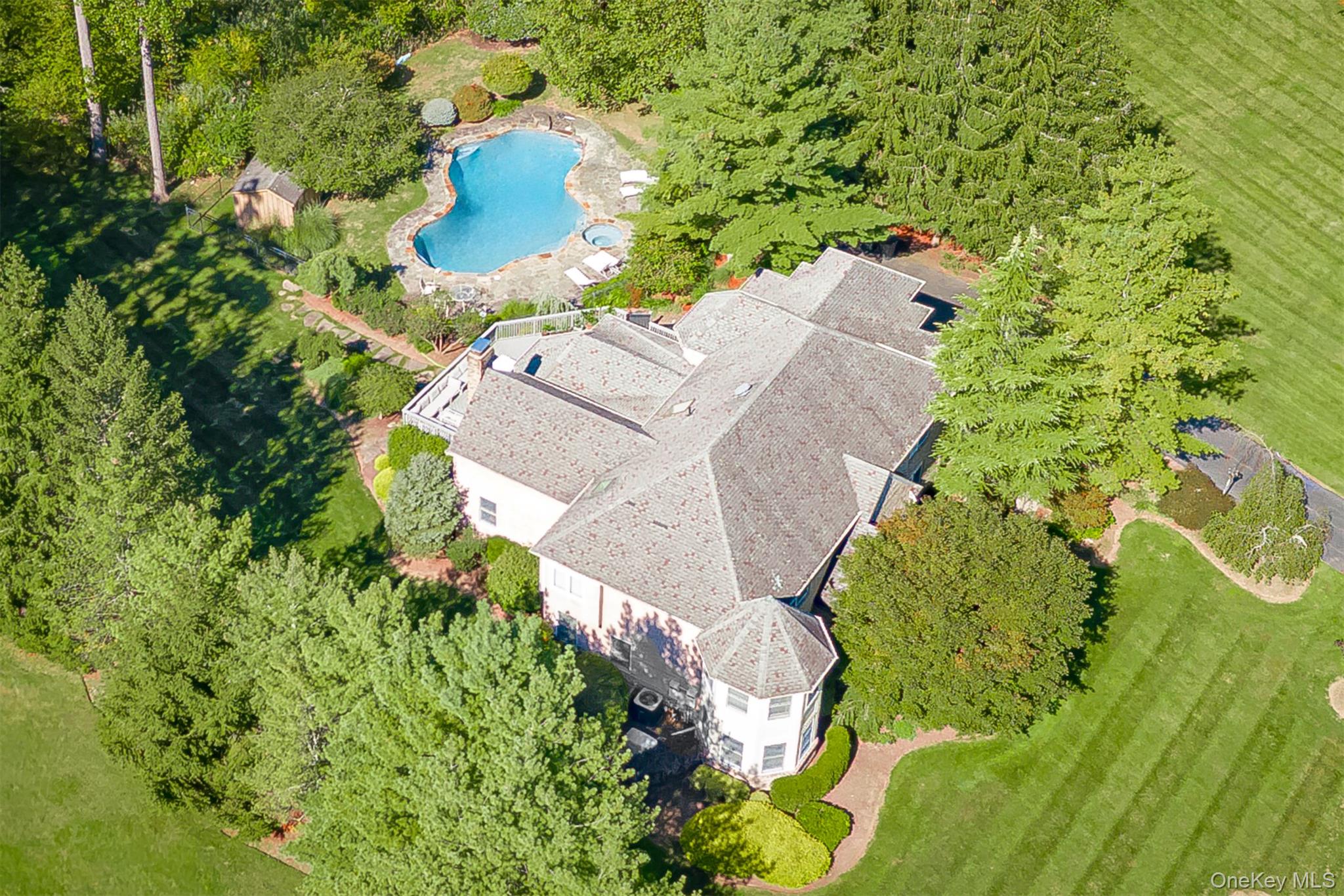MONTEBELLOâ€”THIS EXQUISITE RESIDENCE IS A MASTERPIECE ON OVER AN ACRE OF PURE PARADISE! Imagine arriving at one of the most stunning park-like properties, complete with a resort-style pool with hot tub, lush sprawling lawns, and a setting that feels like your very own private oasis. A dramatic double-story entry welcomes you into a flawless open layout, where an oversized state-of-the-art eat-in kitchen steals the show with two grand islands, abundant high-end appliances, and a design that is truly one-of-a-kind. Entertain in style in the elegant dining room accented by a granite butler&rsquo;s pantry, gather in the formal living room, or relax in the soaring great room that bathes in natural light. The main level also offers a private office/bedroom. Upstairs, retreat to a luxurious primary suite boasting a spectacular spa-like bathroom, while three additional bedrooms and two more full bathrooms offer comfort and convenience for everyone. A dedicated laundry room on the upper level adds everyday ease. The walk-out finished basement expands your living space with a massive family room, a guest bedroom, a full bathroom, and endless possibilities for recreation or relaxation. All of this rests on a breathtaking property that feels like a resort getawayâ€”rare, extraordinary, and absolutely unforgettable. This once-in-a-lifetime opportunity will not last!