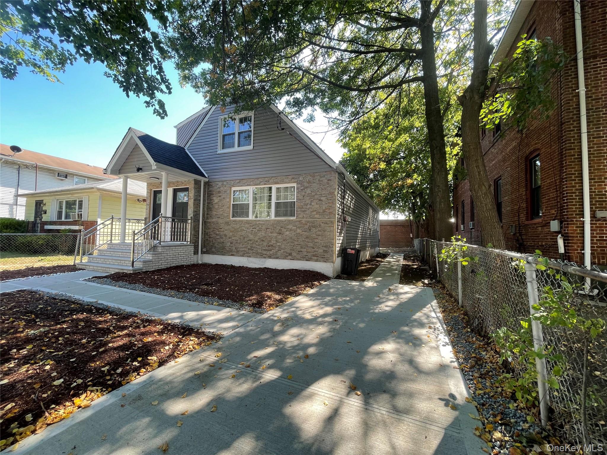 COMPLETELY RENOVATED, LIKE BRAND NEW, TOP TO BOTTOM, FEATURING 3 BEDROOMS EACH ON BOTH FLOORS, 2 FULL BATHROOMS ON EACH FLOORS, 3 BEDROOMS IN BASEMENT, FULL BATH, 2 BOILERS, 2 HOT WATER TANKS. 40X110 LOT. LAUNDRY HOOK UP ON FIRST FLOOR IN UNIT. OPEN FLOOR PLAN,