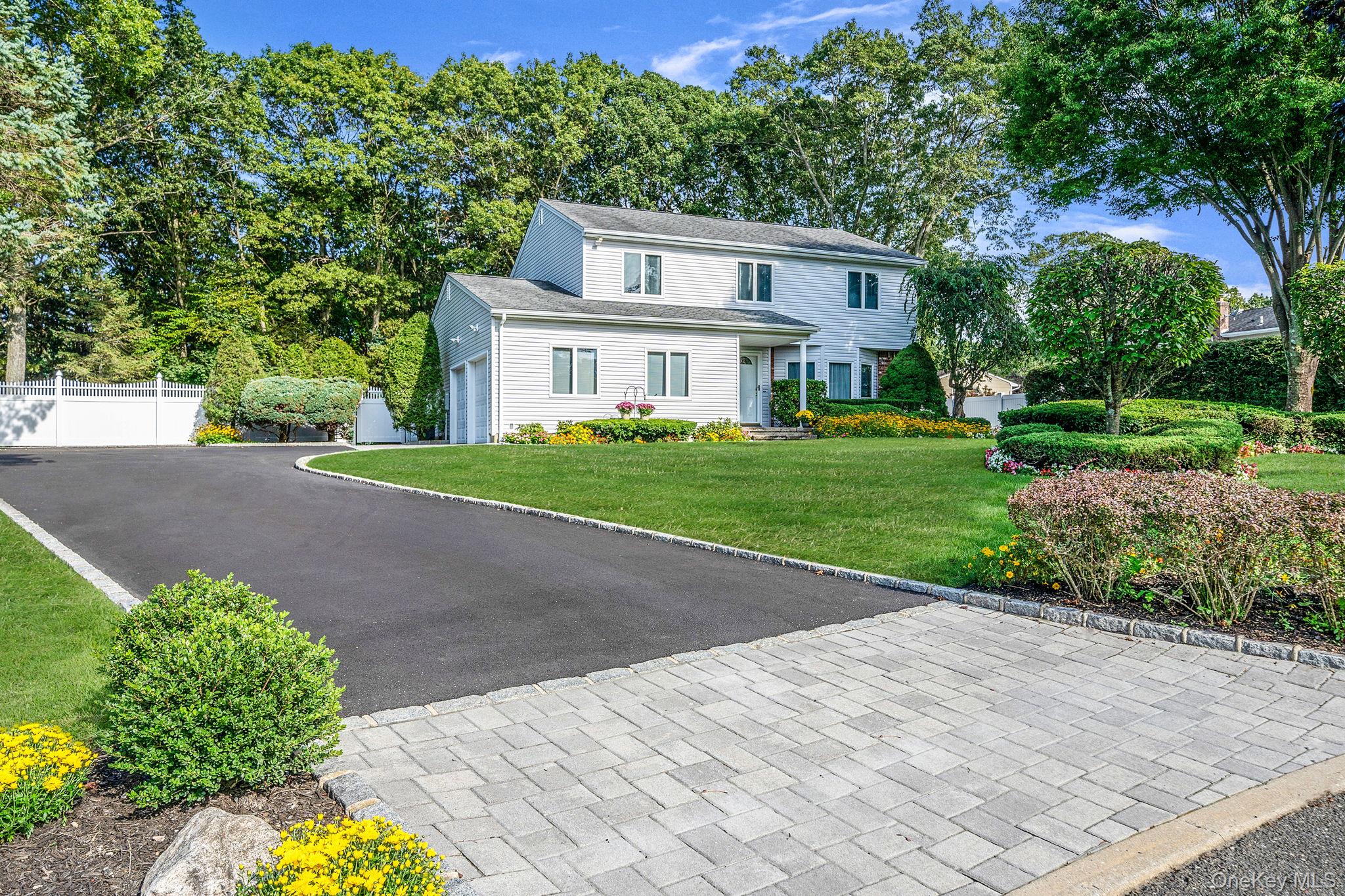 Welcome Home!! Step Inside & Fall In Love With This Light-Filled, Airy 4 Bedroom, 3 Bath Colonial. With Over 2, 400 Interior Sq Ft,  Featuring A Thoughtful Layout Perfect For Entertaining With Spacious Rooms, Basement, Primary Ensuite And Gleaming Oak Floors. Glass Sliders Open To a Professionally Landscaped, Fully Fenced Shy Half-Acre Yard With A Wood Deck And Patio Pavers, Ideal For Indoor-Outdoor Living. Nestled On A Quiet Cul-De-Sac, This Home Backs To A Serene Greenbelt Offering An Abundance Of Privacy & Tranquility. Beautiful Curb Appeal With Stone Walkway, Oversized Driveway And Two-Car Garage Providing Plenty Of Parking & Storage. Conveniently Located Close To Schools, Parks, Shops & Parkways.