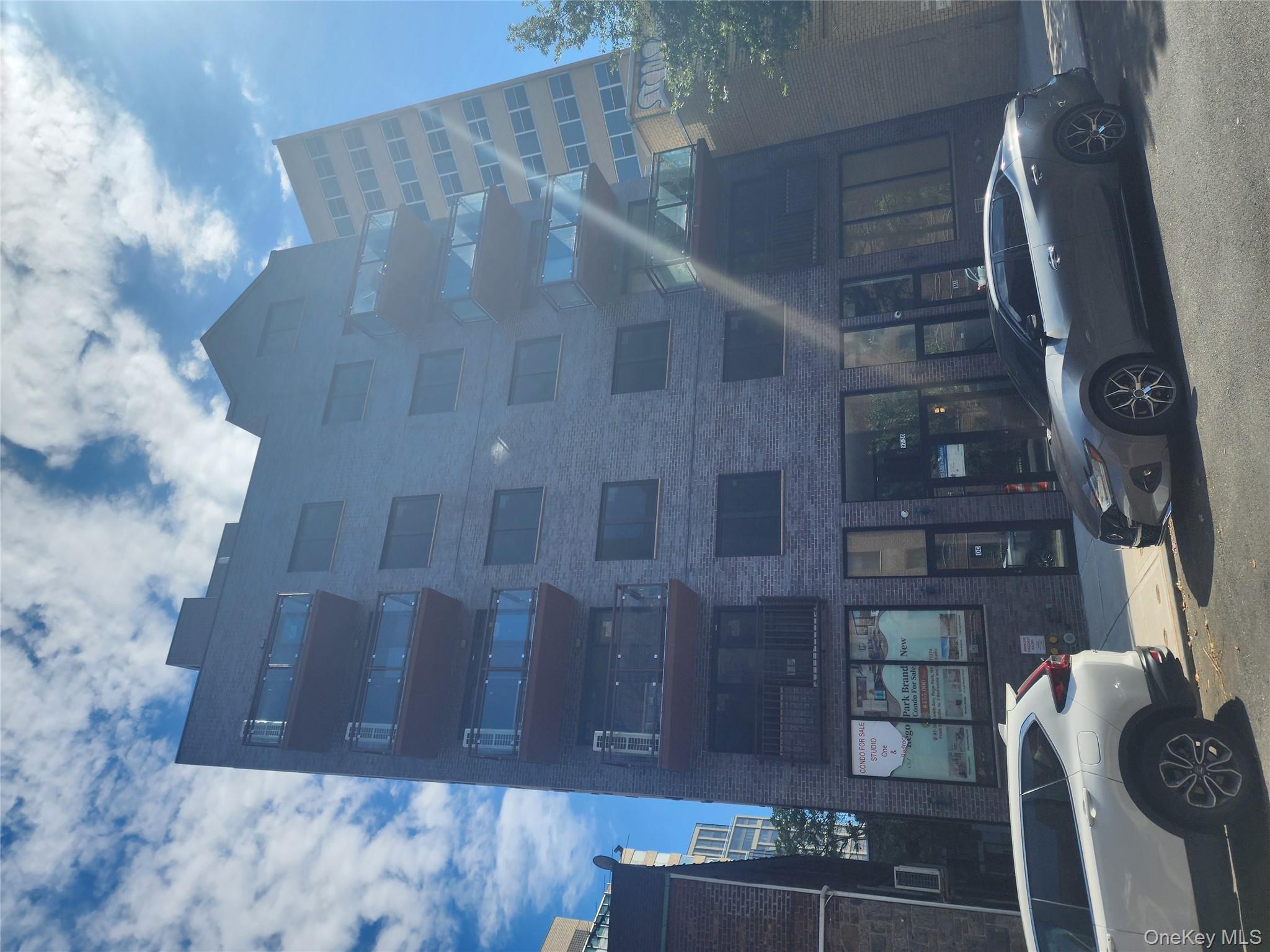 Rego Park - Brand New Studio in Condo building for Rent (approx. 493 sq. ft.) with a private balcony, in-unit washer and dryer and immediate parking is available for an additional charge ($250). Located in prime Rego Park, and only steps to the M and R subway lines, allowing an easy commute to Manhattan in less than 30 minutes. Rent includes hot water and cooking gas. The tenant pays electricity and central air and heating. This unit offers an open floor plan - Living Room and Dining Area and Kitchen, which allows for a great living space, and is perfect for entertaining. A private balcony is right off the living room and has amazing views, ideal for your morning coffee or evening relaxation. The Kitchen offers stainless steel appliances including a stove, refrigerator, microwave, dishwasher and a wall chimney range hood. Everything is brand new and in pristine condition. Hardwood floors throughout and you control your own heat. Ideally situated near shopping, restaurants, highly rated schools, and popular Rego Center Mall (Costco, Aldi, T.J. Maxx, Marshall&rsquo;s, Burlington). This condo is also easily accessible to local and express buses. This move-in-ready unit is ready for your creative touches. Call today for an appointment!
