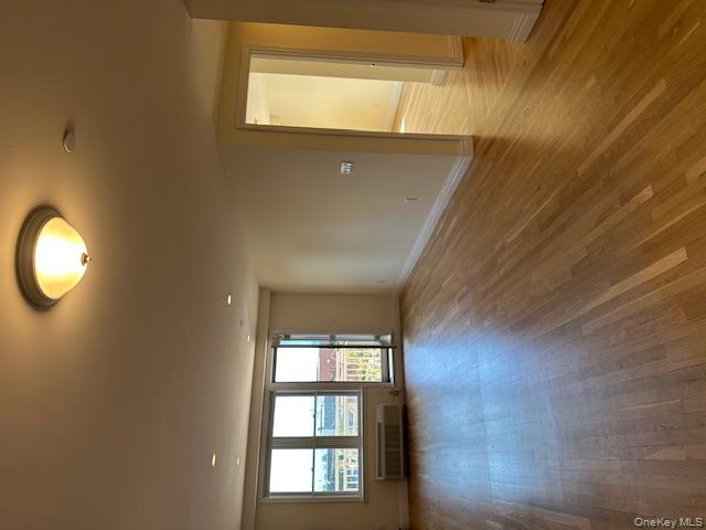 Luxury two bedroom two bathroom apartment in beautiful high rise building, across from the ocean! Perfectly located in the center of town: steps to beach, block to LIRR, and walk to shops, boardwalk, restaurants and more. This two bedroom, two bath apartment with terrace facing south, offers a beautiful, open layout, large closet space, hard wooden floors, marble/granite kitchen with stainless steel appliances, fireplace (remote controlled), and master bedroom suite (master bath with double sink, separate shower and separate jacuzzi tub) + master walk-in-closet! Private laundry in apartment. Building has 24/7 doorman, full gym, rooftop with NYC views, pool, parking (one garage space + one carport space), tennis and basketball courts! Pets welcome. Available for Move In October 1.