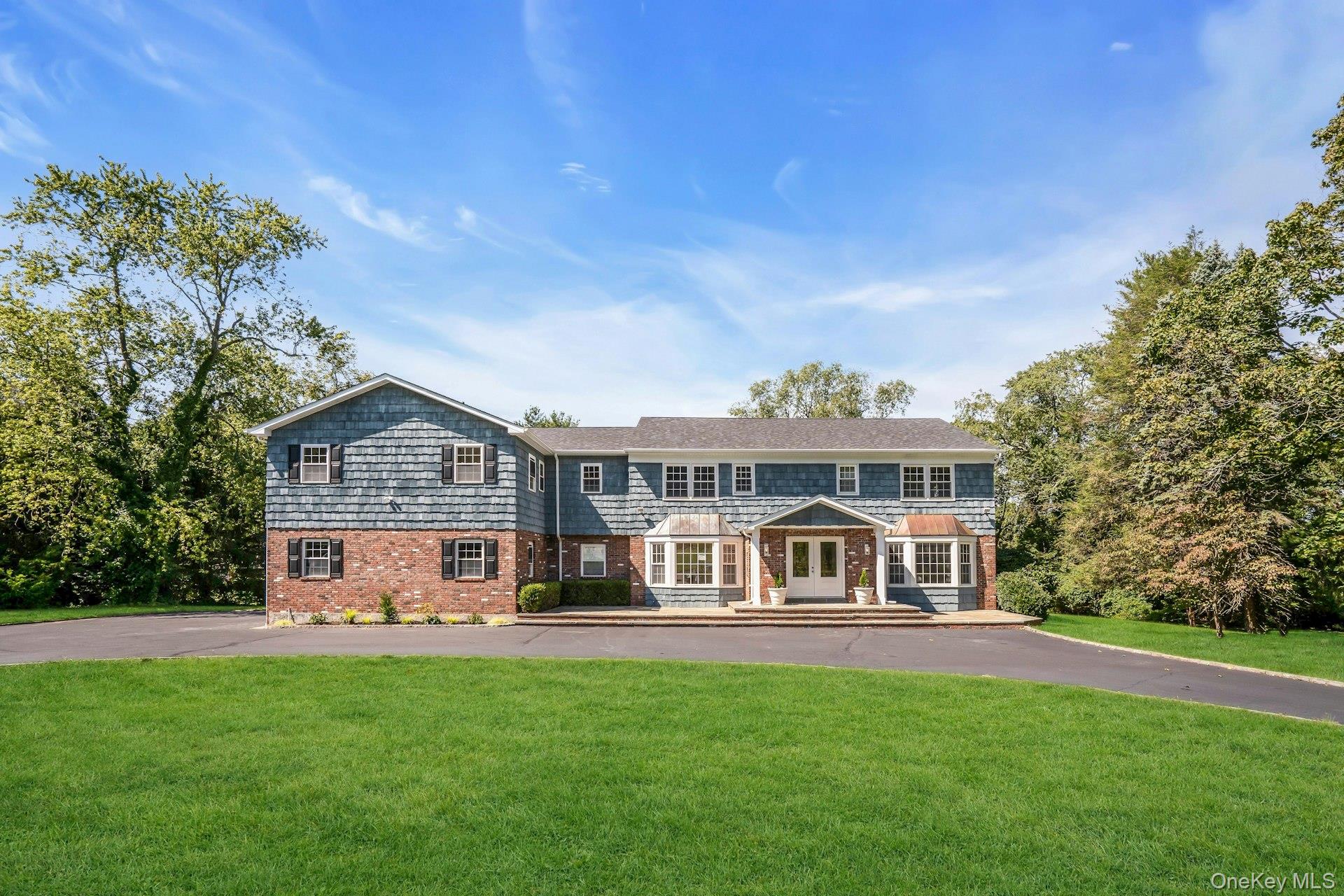 Welcome to 20 Rolling Drive, Glen Head, NY - Set on a pristine 2 acres of rolling lawn. 6 Bedrooms  6.5 Bathrooms  4, 868 Sq Ft  Colonial Discover the perfect balance of space, style, and modern updates in this fully renovated 5000 sq ft Colonial, with a basement and garage included it is approximately a 7000 sq ft total structured home, ideally located in prestigious Brookville. With 6 bedrooms, 6.5 bathrooms, and expansive grounds, this home is designed for both elegant entertaining and everyday living.Inside, a sun-filled open floor plan highlights wide-plank hardwood floors, oversized windows, and seamless flow between living spaces. The chefâ€™s kitchen features Viking appliances, quartz countertops, custom cabinetry, dual sinks, an oversized island, a wine fridge, and sliders opening directly to the backyard. A spacious family room with a stone, wood-burning fireplace and multiple dining and living areas creates versatile spaces for gatherings. There is even an elevator that takes you from the garage to the first floor and then to the primary bedroom.Upstairs, the luxurious primary suite includes a spa-inspired bath, while five additional bedrooms and updated bathrooms with LED mirrors and sleek finishes offer comfort and flexibility.The finished full basement adds even more living space, complete with a full bathroom, laundry room, and endless potential for a gym, media room, or guest suite.Outdoors, the property is a true retreat, featuring a sparkling in-ground pool, two large patios, and a sprawling grassy yard ideal for entertaining or recreation. A circle driveway and 3-car garage provide convenience and curb appeal.Peace of mind comes with major updates, 3 brand new CAC systems, Boiler 2017, and a new roof.Situated close to top-rated schools, golf, shopping, dining, and major highways, 20 Rolling Drive offers estate-style living with every modern convenience.Move-in ready, spacious, and built for todayâ€™s lifestyle, this Brookville gem has it all. 2 Acres, 3 Car Garage, Boiler 2017 - 5 zones, Natural Gas, Radiant floors in primary bathroom, Elevator, 400 AMP, New Roof, soffits and leaf guards, 25 X 50 gunite pool newly diamond dusted, 12 Zone Sprinkler System in the front and back, CAC.