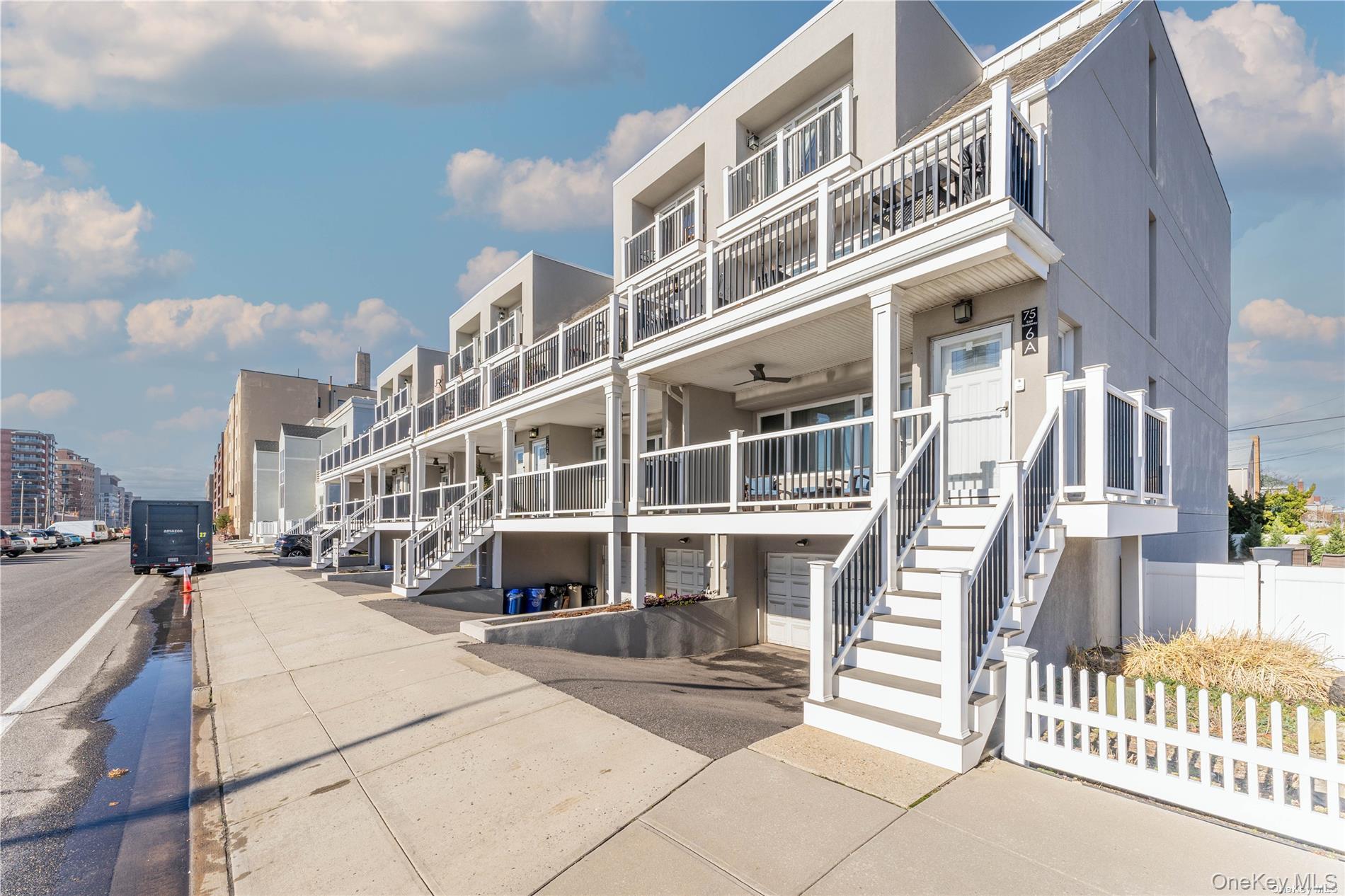 WINTER RENTAL Welcome to your new ocean view townhouse, available through May 15th boasting 2 bedrooms and 2 full bathrooms, and all the amenities you need for a luxurious and comfortable living experience. This townhouse has been completely remodeled with an exterior featuring brand new stucco, Trex terraces and paved driveways that provide ample parking for you and your guests. The private garage offers additional storage and parking space, ensuring that you always have a convenient place to keep your car and belongings. As you step inside, you&rsquo;ll immediately notice the stunning new flooring that runs throughout the home. The remodeled kitchen and bathrooms are truly a chef&rsquo;s and designer&rsquo;s dream, with high-end finishes and modern appliances. Enjoy a glass of wine or entertain guests with the built-in island that adds a touch of sophistication to your space. Your own private laundry is conveniently located within the unit, allowing you to stay on top of laundry without having to leave the comfort of your own home. Step outside and enjoy the community gazebo, firepit, seating, and grill - perfect for hosting BBQs or enjoying time outdoors with friends and family. This townhouse is located just steps from the beach, boardwalk shopping, and the LIRR, making it the ideal location for those who want to be close to all that the city has to offer while still enjoying the tranquility of a beachside home. Don&rsquo;t miss out on the opportunity to call this gorgeous townhouse your new home!
