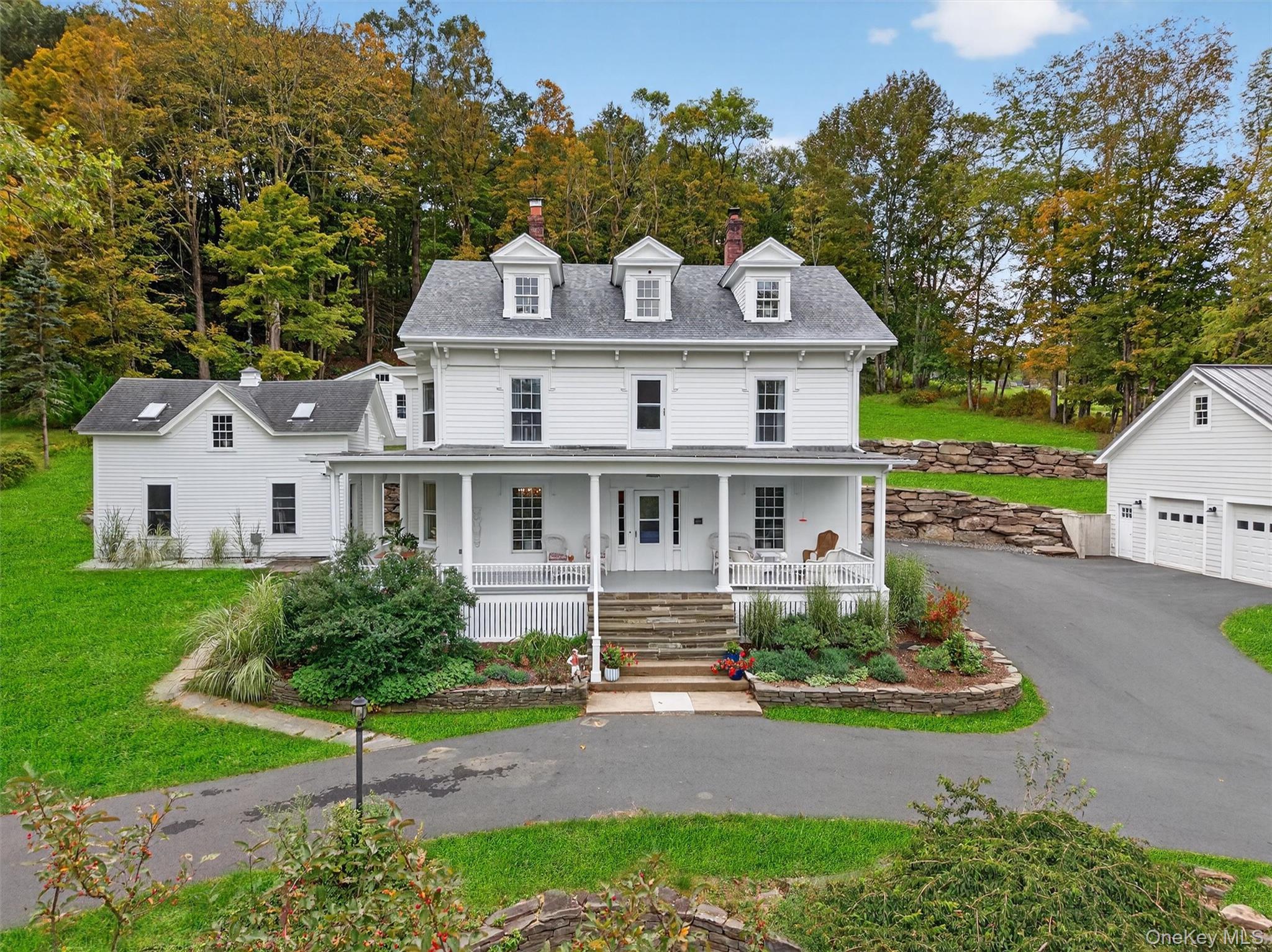 The Otto Appley House - 1657 River RoadStep back in time while living fully in the present at this rare grand dame of the Delaware River, the Otto Appley House. Built in 1900 for the Appley family of physicians, this 5BR/2BA, 3, 669 sq ft Colonial Revival residence is individually listed on the National Register of Historic Places. Steeped in history yet thoughtfully modernized, the home embodies the perfect blend of preservation and contemporary comfort.The home&rsquo;s wrap-around porch floats above your own private 500 feet of Delaware River frontage, offering front-row seats to one of the area&rsquo;s most iconic landscapes. Inside, period character meets invisible modernization: gleaming hardwood floors, Andersen divided-light windows, original storm windows, and high-efficiency upgrades like a Navien propane combi-boiler, LG ArtCool ductless mini-splits, and blown-in dense-pack cellulose insulation. Warmth and ambiance flow from two Kozy-Heat gas fireplaces, ensuring three sources of efficient winter comfort.The second floor offers four bedroomsâ€”each with its own sinkâ€”plus a smartly configured bath with recirculating hot water. The third floor, reimagined from attic to living space in 2021, now hosts two sound-insulated office suites with in-floor power, ethernet, Velux skylights, and closed-cell spray foam insulation.Beyond the main house, the property boasts a new 2, 000 sq ft climate-controlled garage with 13-foot ceilings, dual EV chargers, and expansive upstairs storage. Outbuildings include a rehabbed well house, a summer kitchen with panoramic eagle&rsquo;s-nest views (plus architectural plans for further expansion), and terraced grounds with an oversized 8-foot fire pit overlooking the river.Whether launching kayaks from your private access, fishing steps from your porch, or floating downriver to Narrowsburg, this property delivers the quintessential Upper Delaware lifestyle. All major systemsâ€”from new driveway and drainage to a whole-house Generac generator-have been updated for peace of mind.A rare offering of history, luxury, and riverfront livingâ€”just two hours from NYC.