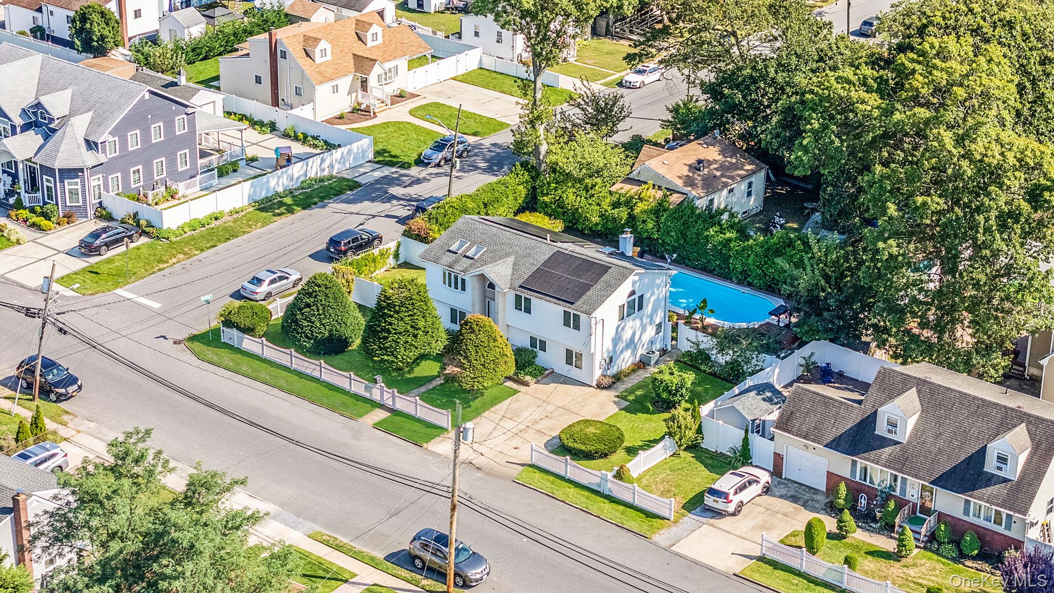 Welcome to 540 Scudder Ave. This is truly a very unique and custom home. Beautifully renovated in 2011, this impeccably maintained home in Copiague blends timeless style with modern comfort. Featuring hardwood floors throughout the second level, an updated designer kitchen with a center island complete with a wet sink. The spacious primary suite has a double vanity, en suite bath, and generous walk-in closet, every detail has been thoughtfully designed. Upgraded 200 amp electrical panel, updated gas burner, solar panels and central ac. Modern bathrooms with double vanities and spa like rain shower. The home is filled with bright, sun-drenched rooms, offering warm natural light throughout the day. The versatile layout offers potential for a mother-daughter setup with proper permits, providing added flexibility for extended family or guests. Step outside to a true backyard oasisâ€”a fully fenced and private retreat with manicured plantings, an in-ground pool, inground sprinkler system, custom BBQ, and lush landscaping that feels like your own personal resort. Perfect for entertaining or relaxing in total privacy. Ideally located close to schools, shopping, and transportation, this home offers exceptional living both inside and out.