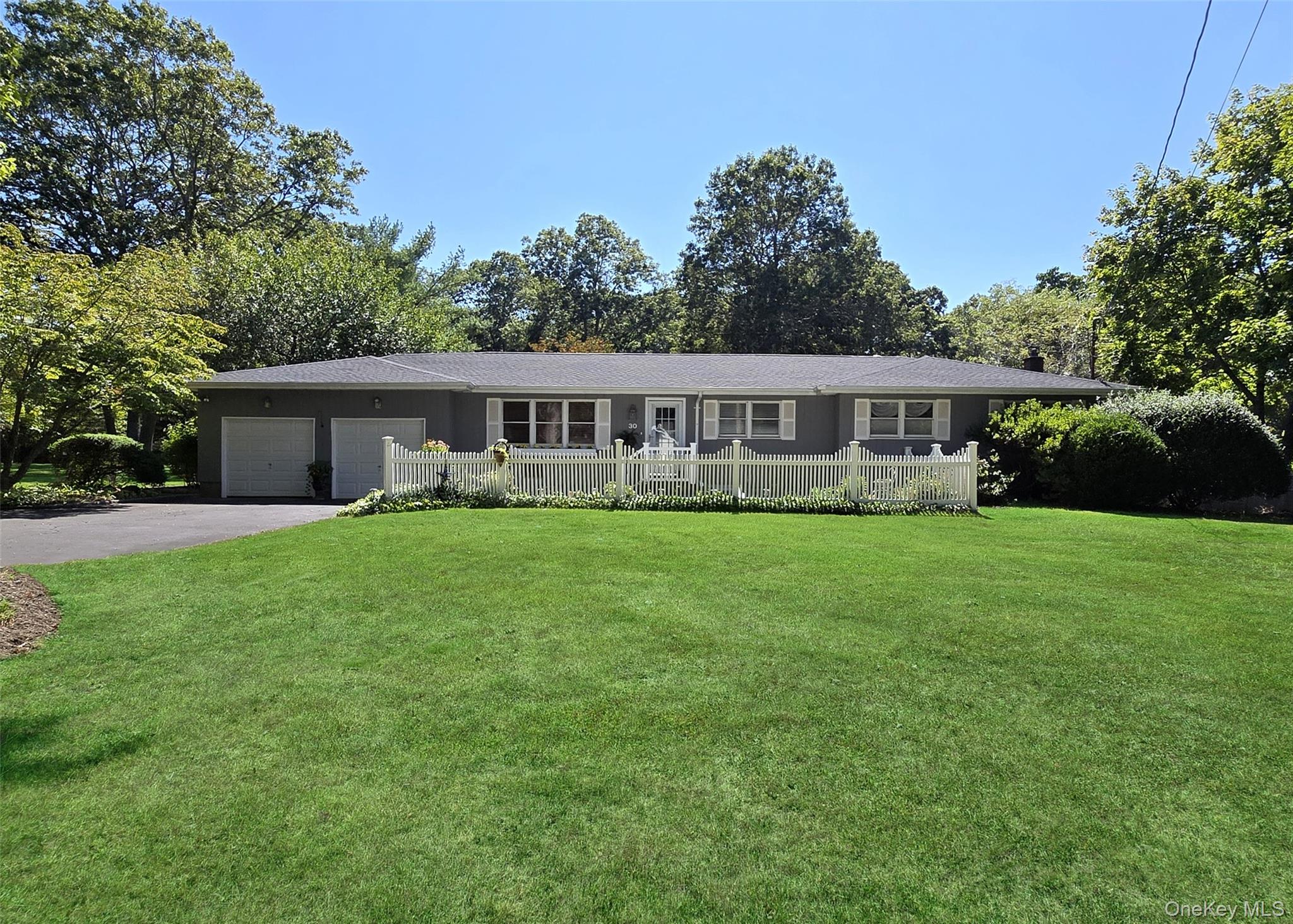 Magnificent Ranch with 4 bedrooms and 2 full baths. Features Formal living room with wood floors, Kitchen with white cabinets and SS appliances Vaulted ceilings and recessed lighting with a dining Area that has french doors into the Great room with wood beams and fireplace, Spacious Deck, 2 car garage, Full basement. On 2 acre Park like Horse property with Koi pond. Possible M/D w proper permits.