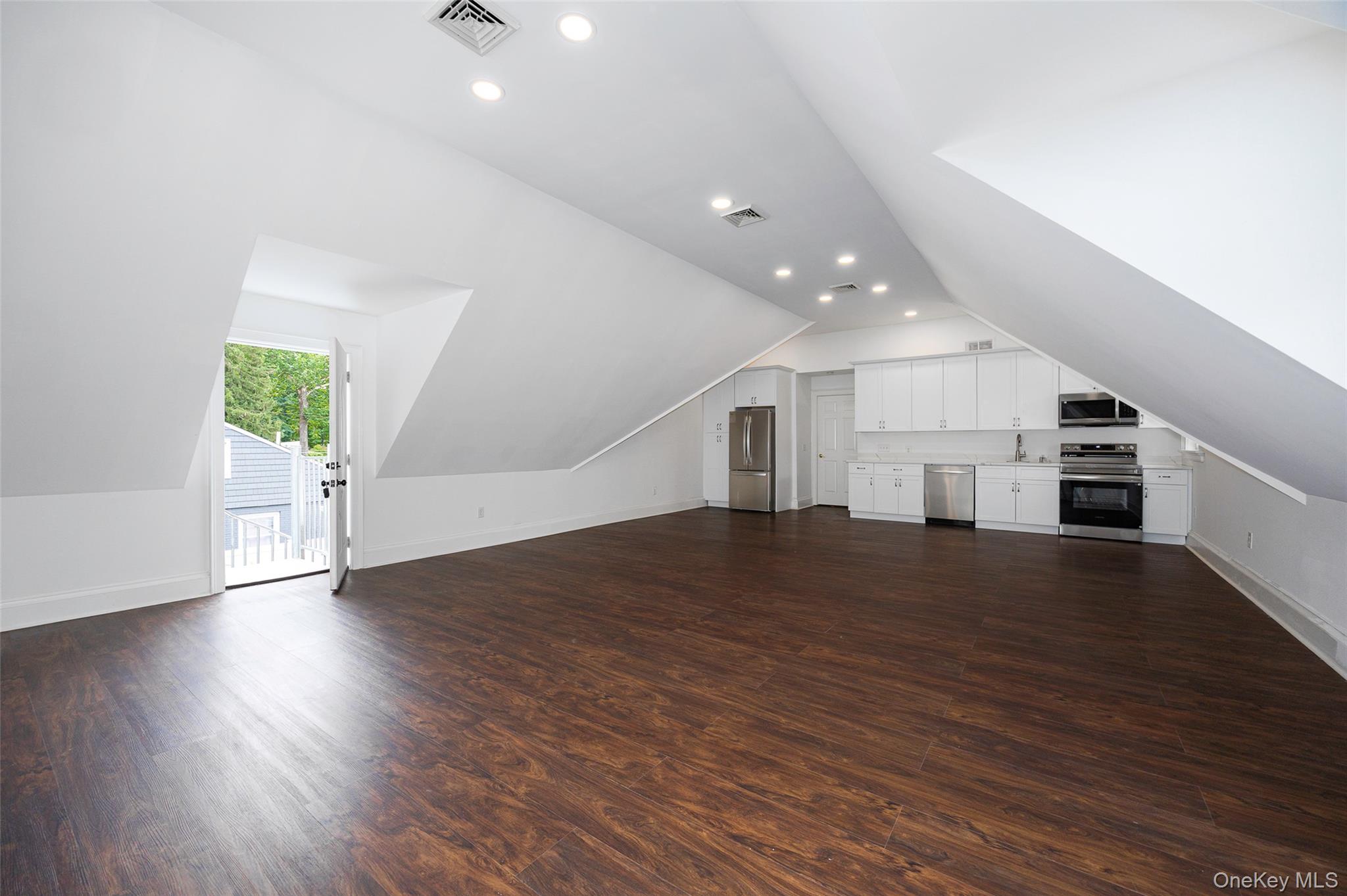 If you are looking for a unique and beautiful 2-bedroom rental, this is it! Centrally located, this young and exceptional space is housed in a young, contemporary colonial home and is super large, boasting a really fabulous Great Room with 10 foot ceilings. This huge great room is breathtaking and has a brand new kitchen, new appliances, quartz counter tops, recessed lights and is freshly painted. There are also two roomy bedrooms, a full hall bath with granite counter tops and a brand new washer and dryer housed in it&rsquo;s own laundry room. There is also a large walk in closet in the primary bedroom. The apartment consists of the whole second floor of a house and includes a/c. This prime location is the outskirts of the south side of Poughkeepsie and is within minutes to Route 9, Vassar Hospital, Metro North, Surrounding colleges, and all area amenities. The owner is requesting a minimum credit score of 650 and roughly 3 times rent in income. Don&rsquo;t miss this exceptional rental!