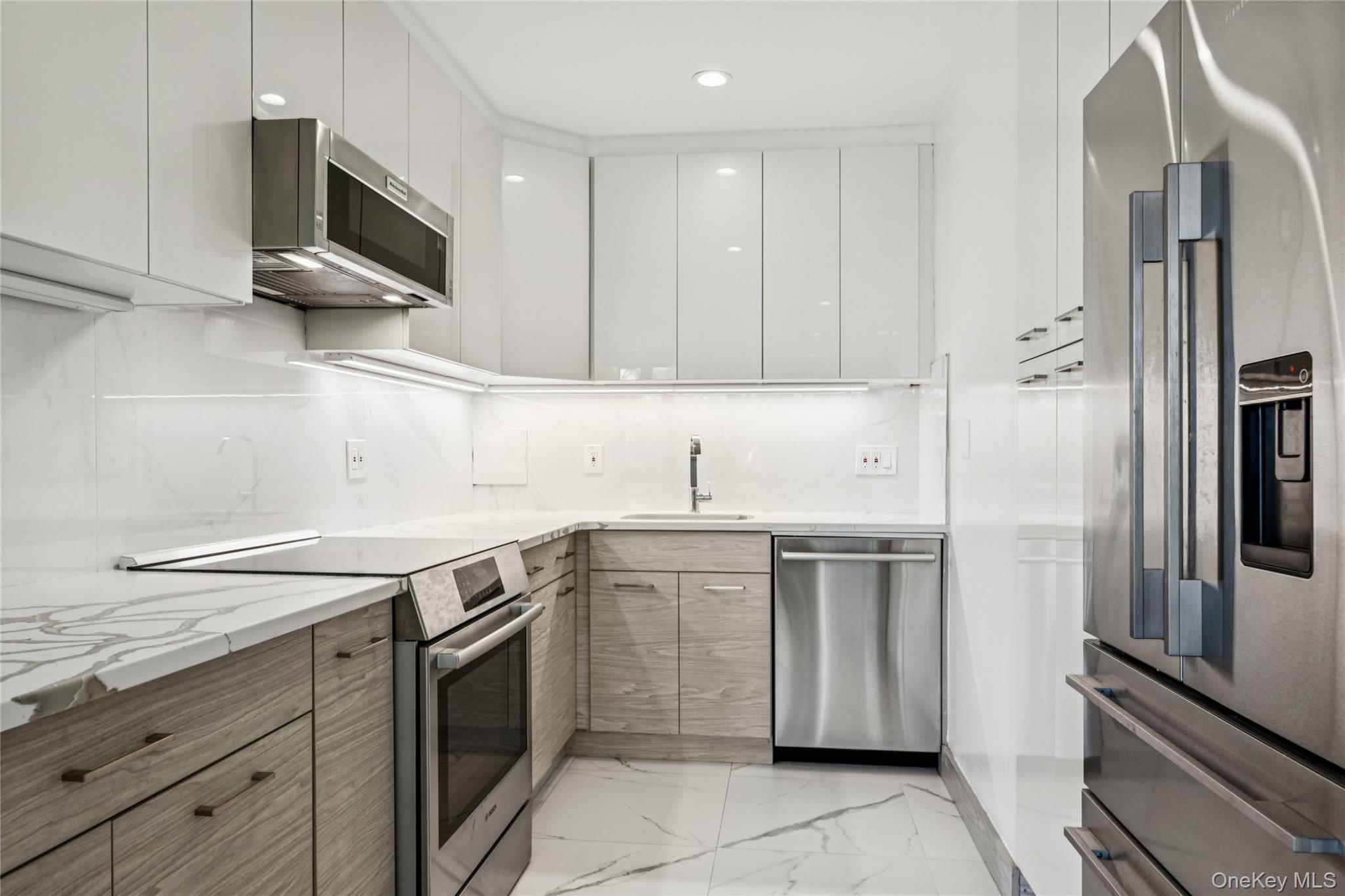 A Fully Renovated And Emaculate 2BR Penthouse With Too Many Designer And Custom Finishes To Mention â€“ Highlighted By Premium Appliances Including A Fisher & Paykel Refrigerator And Bosch Dishwasher And Stove. Open Concept Kitchen And A Wall Of Oversized Windows Along The Entire Living/Dining Areas. Recessed Lighting Throughout Living Spaces And Under Cabinet Lighting In Kitchen. Great Light And Air And Closets Galore. Enclosed Private Glass Terrace Facing Due West. Washer Or Dryer On Every Floor. Le Havre Amenities Include: 2 Outdoor Pools, 3 Tennis Courts, A Fitness Center, Clubhouse/Cafe, Playgrounds And A Park Like Setting.
