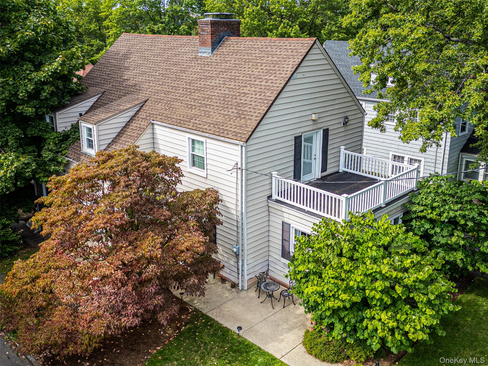 Located on a quiet, tree-lined street in the village of Pelham Manor, this 3-bedroom, 3-bath home combines charm with modern comforts. Measured at 2300 square feet, the home is conveniently located near local shops, restaurants, Pelham schools and Glover Sports Complex. Step inside and youâ€™ll notice the thoughtful updates throughout. Sunlight streams through brand-new energy-efficient windows, while recessed lighting creates a warm and contemporary feeling. The spacious kitchen has been renovated with a sleek backsplash and upgraded appliances, including a new range hood, dishwasher, and disposal. A new butlerâ€™s pantry adds to the kitchen space and comes complete with a full refrigerator, dual-drawer refrigerator, additional sink, and custom counters and cabinetryâ€” all perfect for entertaining and keeping your home organized. Upstairs, the primary suite includes a fully remodeled bathroom and a private balcony. A newly built contemporary deck, easily accessible from the kitchen through new French doors, is perfect for entertaining. The lower level has additional 425 square feet including exercise room, family room with fireplace and laundry. With central air, updated electrical throughout, this home is waiting for its next chapter.