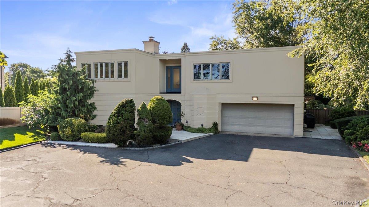 Step into this beautiful, romantic side-hall Colonial, where timeless elegance meets modern comfort. Genuine marble floors flow throughout, onyx bathrooms, complementing handmade fireplaces and soaring ceilings. An inviting in-ground pool and pool house, a fully finished basement create endless opportunities for entertaining and relaxing. With abundant gathering spaces and set on one of Back Lawrenceâ€™s most picturesque blocks, this exceptional residence is truly a must-see.The information has been provided by the Seller and public records and has not been verified by the Broker. Information is deemed reliable but not guaranteed.