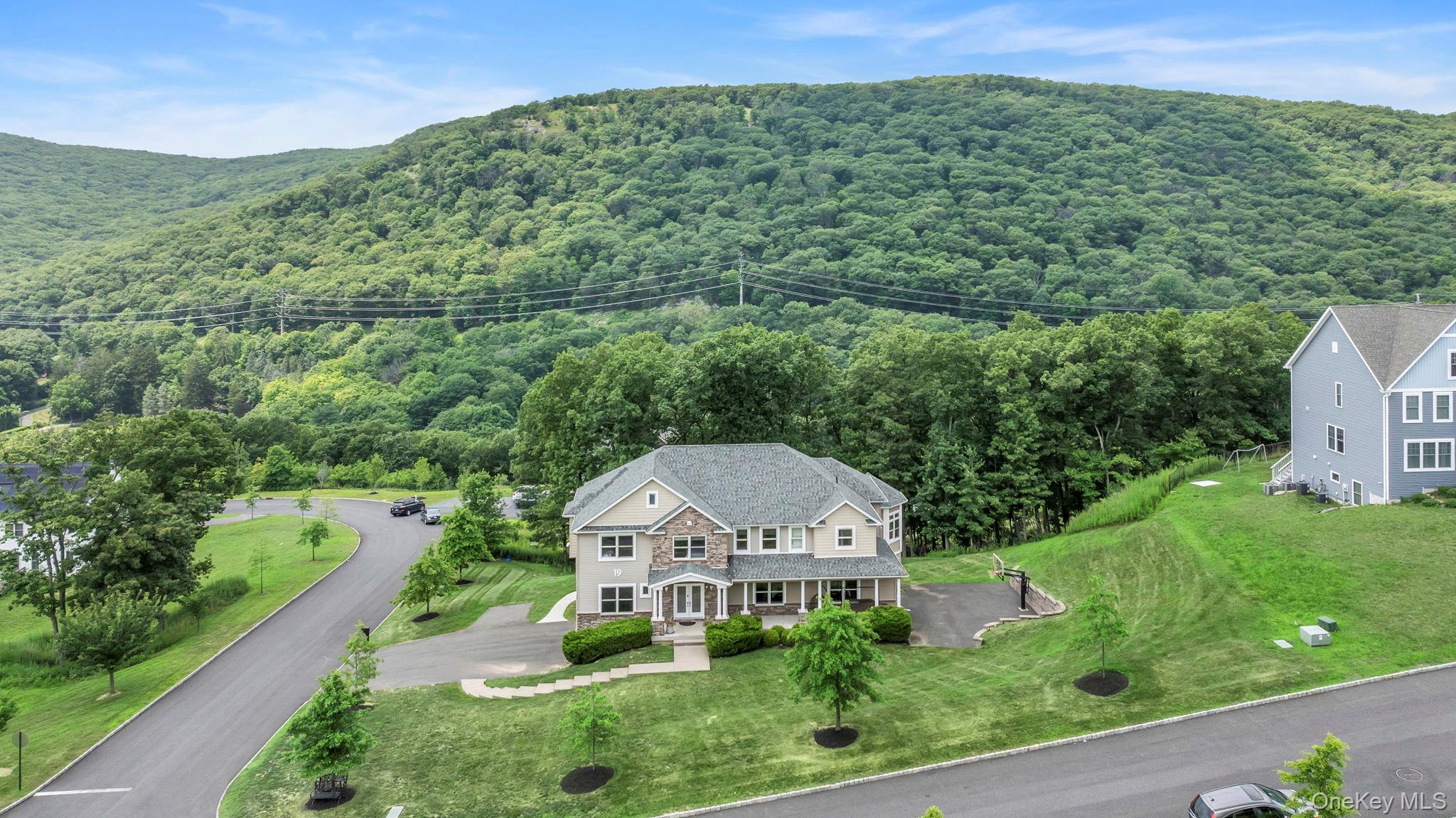 Pomona! A Rare Find in Rockland County!Perfect for extended families, a summer retreat, or anyone who loves to entertain, this young colonial offers incredible space and flexibility. With 8 bedrooms and 5.5 fully tiled bathrooms, thereâ€™s room for everyoneâ€”inside and outâ€”on a scenic property featuring unobstructed mountain views.The main level boasts a grand dining room, chefâ€™s kitchen with 2 sinks, 2 ovens, a double fridge/freezer, stone backsplash, abundant cabinetry, and a butlerâ€™s pantry. The spacious family room features a cozy gas fireplace and opens to a unique bonus â€œround roomâ€â€”an ideal spot for relaxing or entertaining. Also on the main level: 2 bedrooms, 1.5 bathrooms, a library, and plenty of closet space.Upstairs, every bedroom is oversized and can accommodate two double or queen beds, each with organized closets. Enjoy outdoor living on the double-sized deck off the kitchen, a lower-level patio, a basketball court, and moreâ€”all in a welcoming neighborhood. Move right in and enjoy the space, style, and setting you&rsquo;ve been waiting for!