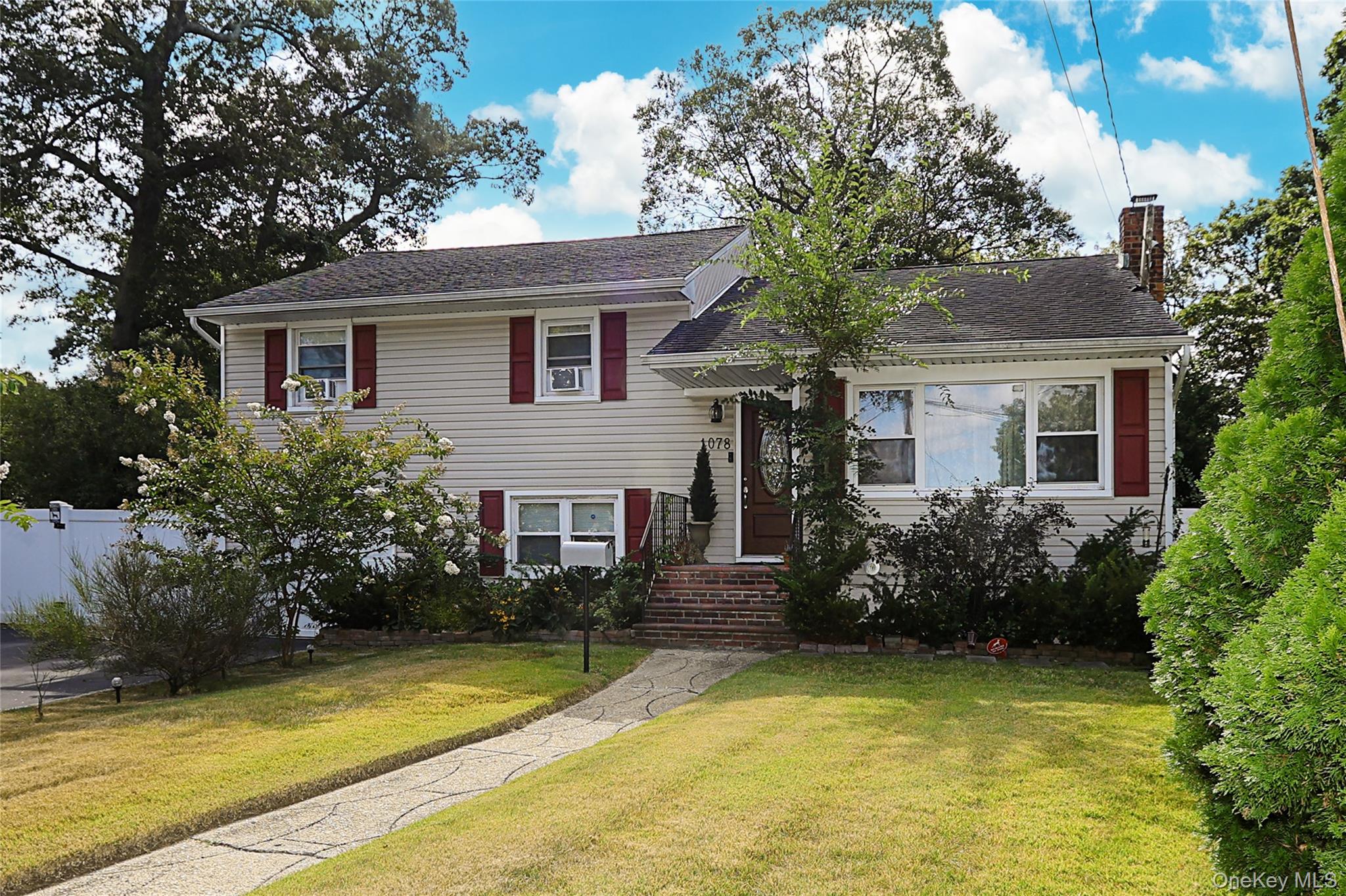 Welcome to this spacious and move-in ready split-level home in the heart of Uniondale! Featuring 5 bedrooms and 3 fully updated Bathrooms, this home offers plenty of space for extended family or guests!Step inside to find hard wood floors throughout and an airy, open-concept layout, creating a warm and inviting atmosphere. The updated eat-in Kitchen flows seamlessley into the dining and living areas with sliders leading out to a large deck, ideal for entertaining or enjoying the fall evenings! 3 bedrooms and 2 full baths on the upper level. Master has en suite!!!!. Lower level 2 add&rsquo;l bedrooms plus 1 full bath and private entrance along w/ living space. The home is complete with a full finished basement, Full Bath and Laundry.Siting on a large lot and Cul-De-Sac there&rsquo;s plenty of room to enjoy outdoor activities or future expansion. Mother/Daughter with proper permits and seperate entrance. This home truly has it all - space, style and a fantastic location close to shops, schools and transportation.  Don&rsquo;t miss your chance to make this one yours!!!LOW TAXES!!! House was completely redone 7 years ago. Roof, Heating system, Electric Panel.etc.