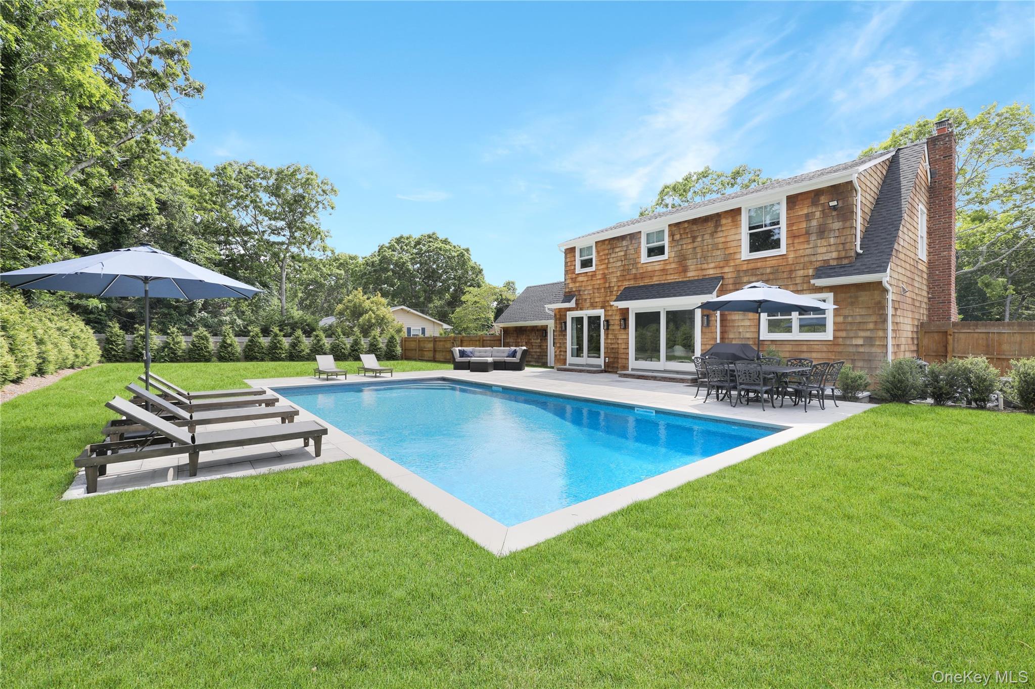 Welcome to Westhampton Beaches hottest summer rental south of the highway! The fully renovated home&rsquo;s first floor boasts an eat-in-kitchen/dining room with Viking appliances, living room w/fireplace, office/fourth bedroom, mud room and full bath. The second floor consists of a master suite, two guest bedrooms and full guest bath, all three bedrooms have cathedral ceilings. The legally finished basement is the perfect hangout for games, movies or rainy days for the kids to play. Entertain your guests in the manicured backyard with heated in-ground pool and patio for dining. Located within walking distance to houses of worship, town and the village beach. **AVAILABLE FOR: May ($20K)  June ($30K)  July ($40K)  August-LD ($40K)  September ($15K)  Memorial Day - Labor Day ($110K)**