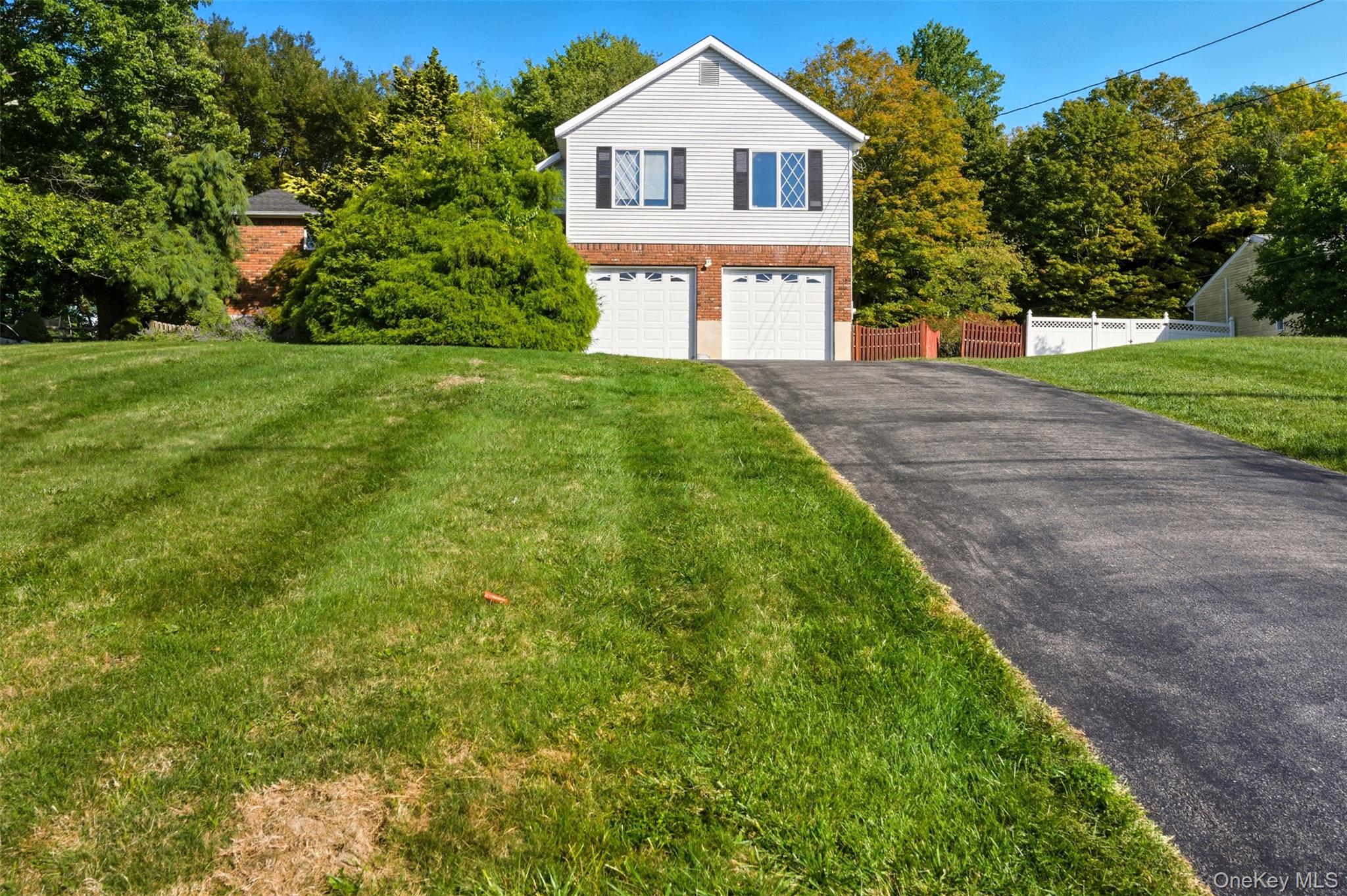 Opportunity & LOCATION! Renovated and well maintained split-level style home in Highland Mills/Woodbury NY. This impressive home offers over 2300 sqft. Bright dining/living/family rooms with lots of spotlights and loaded with windows throughout. Large eat in kitchen features granite countertops, and costume wood cabinetry. 3 spacious and sunny bedrooms 2.5 baths, master with jetted tub and walk-in closet. Lower level includes an additional living room/playroom, and partially finished basement adds 322 sqft of living space. Enjoy the fenced backyard and maintained landscaped property with plenty of space to entertain. Near all Conveniences, Public Transportation, Major Highways, Woodbury Commons and Shopping malls, here is so much more in this wonderful neighborhood, Just Waiting for You.