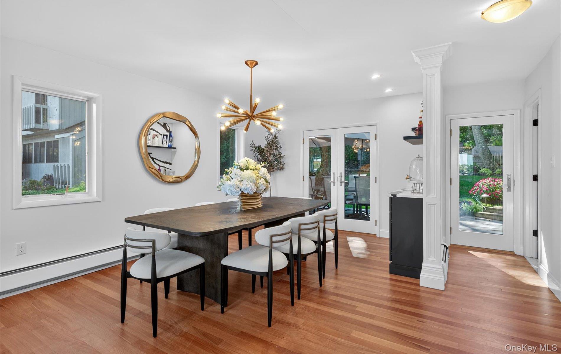 It&rsquo;s not easy to describe a home that has it all!A home that provides a feeling of peace, serenity and pride. Feels like you are on vacation everyday, as you are part of the Private Huntington Beach Club Assoc. Year round activities in this Community are hard to duplicate with organized activities and events for children and adults. This community has everything you want. Whether for gathering with neighbors or looking for some me time relaxation, its right here for you.This magnificent home has an amazing open floor plan for entertaining. As you walk into a bright generous entry foyer, you have a beautiful full view to the French doors leading to the back yard. A sexy, modern sleek design (totally rebuilt in 2023) with many additional custom upgrades done in 2024. Spectacular custom bar was built in the dining room, with a modern/unique backsplash and countertop. New high end appliances were added to the beautiful kitchen, including a smart refrigerator, new dishwasher, new washer and dryer. New gas boiler also installed in 2024.The gorgeous primary ensuite, with Juliet balcony, now has a fabulous custom walk in closet in the primary bedroom. Custom remote control shades, in primary bedroom, that unleashes a spectacular view of the harbor. Brand new Mahogany wood floors in all three bedrooms.Let&rsquo;s not forget that you are conveniently minutes away from Huntington Village AND Northport Village as well as in close proximity to the Huntington and Cold Spring Harbor Train Stations.