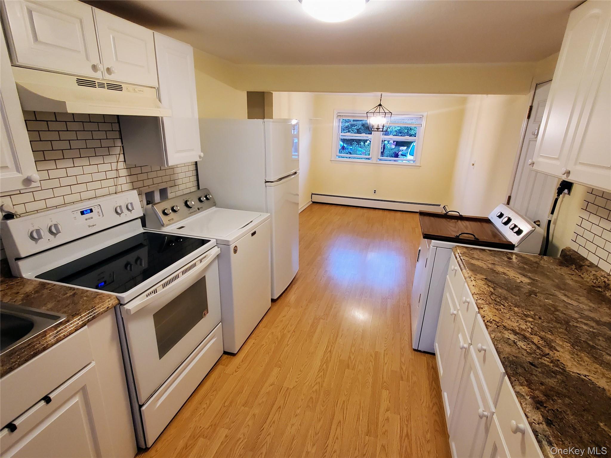 Attractive, Spacious and Very Bright Apartment in Hi Ranch. Nicely Renovated and Features a Private Entrance, Big Stone Patio, New Kitchen w/ Dishwasher, Washer/Dryer. Close to LIRR, Park, Store, Restaurants.