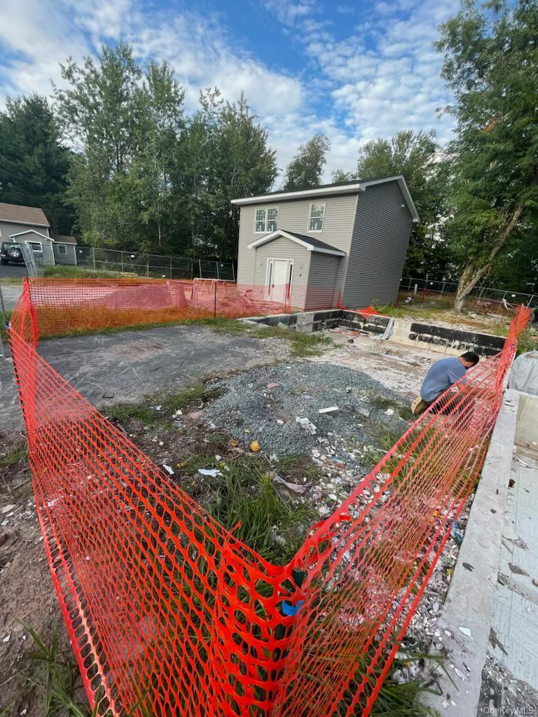 A unique opportunity to build a new townhouse on a property where the previous structure was demolished. The foundation has already been laid, and the sale includes approved engineering plans for the new build. The parcel is located in kiamesha lake Patio homes development with amenities like the club, pool , playgrounds etc Centrally located near shopping centers, medical facilities, lakes and more