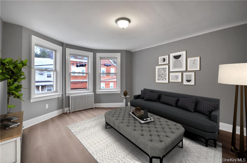 Discover the perfect blend of comfort and convenience at 234 Edwards Place, a charming three-bedroom apartment nestled in the heart of Yonkers, NY. This gem offers a newly renovated bathroom and an upgraded modern eat-in kitchen where warm memories and delicious meals await. Elegant flooring flows throughout the home, adding a touch of sophistication to your daily living. Step into the spacious and sunny living room, an inviting space that promises to be the backdrop for your relaxation and entertainment. This apartment is tailored to meet the needs of a dynamic lifestyle. In addition to the comforts inside, you&rsquo;ll have access to a shared backyard â€“ a peaceful retreat for outdoor fun and unwinding in the fresh air. Parking woes are a thing of the past with your own dedicated parking space, adding to the stress-free living experience at Edwards Place. Situated in a friendly neighborhood and close to local amenities, you will thrive in this delightful community. This is more than just an apartment â€“ it&rsquo;s a sanctuary for you to create lasting memories. Don&rsquo;t miss out on the opportunity to plant your roots in this sought-after Yonkers locale.