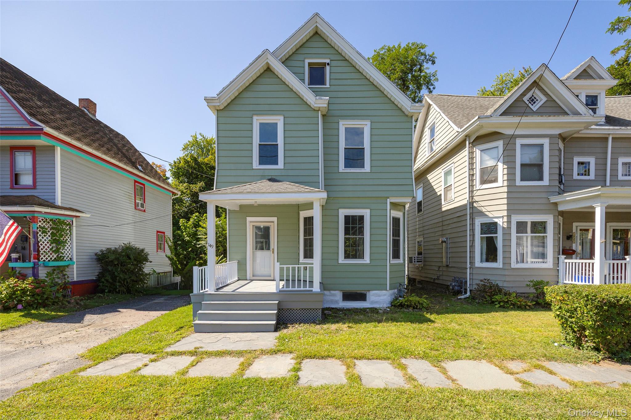 Centrally located and tastefully updated, find this 3 bedroom, 1 bathroom colonial loaded with attractive features. Renovated kitchen includes new cabinets, counters, stainless appliances & subway tile backsplash. Formal dining room w/built-in china cabinet complete with leaded glass flows seamlessly to spacious living room loaded with natural light. Head upstairs passing the perfectly preserved stained glass to find three well proportioned bedrooms and a renovated bathroom. Walk-up attic for abundant storage. New flooring & fresh paint throughout. Relax on the front porch or barbeque on the back deck. Enjoy the conveniences of municipal water/sewer plus natural gas for heating, hot water & cooking. Walking distance to dining, shopping & area attractions.
