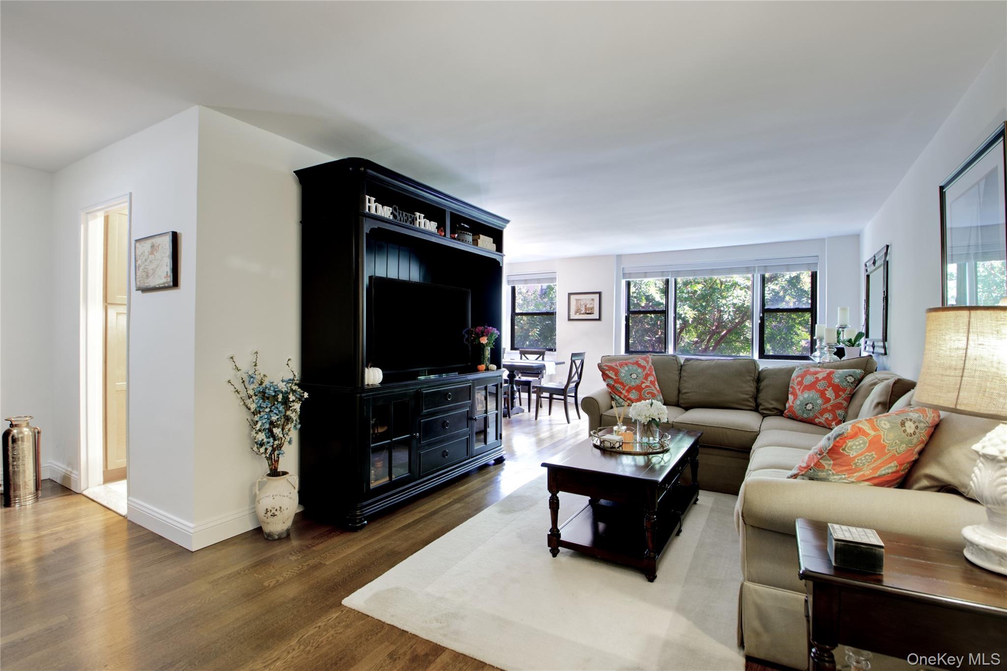 Welcome to Birchwood Courtâ€™s Madison II model -a bright, meticulously maintained and updated one-bedroom, one-bath home. The spacious living room flows into a dining area and sunlit galley kitchen, with gleaming hardwood floors throughout. A versatile alcove offers the perfect spot for a home office or cozy den. The oversized bedroom provides abundant closet space and a full hall bath. Set within a gated community featuring 24-hour security, landscaped grounds, on-site laundry, and one assigned parking spot, this home is minutes from the LIRR, NYU Langone Hospital, shopping, and major highways.
