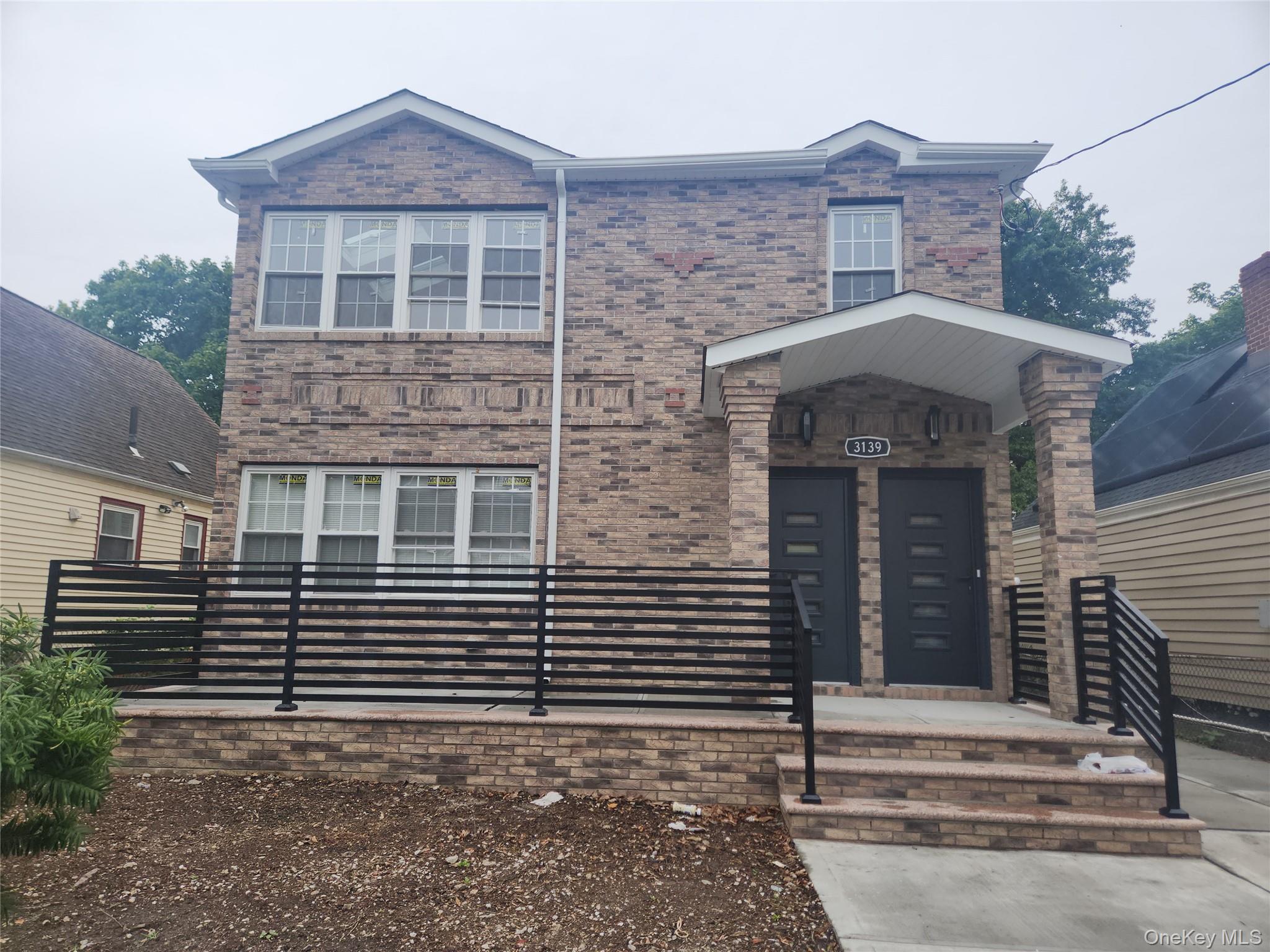 Discover this Stunning Brand-New, VACANT Detached Brick 2-family home with a fully finished basement, private driveway for 3 cars, detached garage and nice size yard.Each unit features 3 spacious bedrooms and 2 modern full baths, including a private en-suite in both primary bedrooms. The open-concept layouts are designed with style and comfort in mind showcasing hardwood floors, recessed lighting, skylights on the second floor, and plenty of natural light throughout.The kitchens are fully equipped with stainless steel appliances (including dishwasher), complemented by elegant marble bathrooms. Added conveniences include AC wall units, 1st floor and side entrance access to the tiled basement, and an outdoor security camera system.Perfectly located near I-95 and just minutes from shopping, dining, and more!