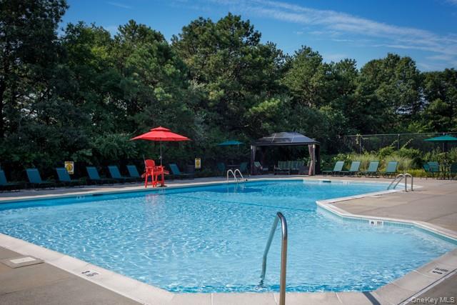 Ask about our specials **Gated, tranquil, Storage avail. Clubhouse, Fit Ctr. Heated pool/sundeck, tennis, playgrd. White shaker cabs w/undermt led lites, quartz ctrtp/backspl.SS appl.Hi-hats.Ceil.Fans.W/D.CAC. vinyl plank flrs. Gray paint.Custom closets.Terrace.Sunrise Hwy, Rte.27A, SS Pkway. Nr.shops, dining, parks, beaches, golf. Nr. LIRR Ronkonkoma, MacArthur Airport. Resort Style.