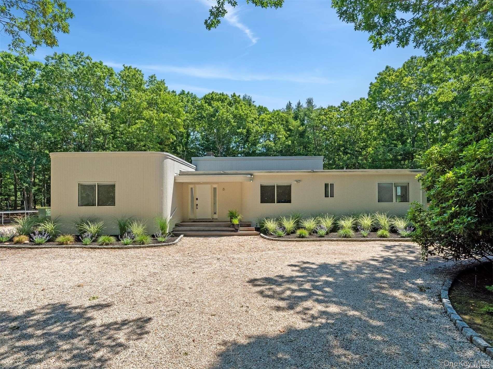 Renovated Quogue Contemporary - Newly renovated, chic and airy 5 BR/ 4 BA home on a quiet street in the village of Quogue. The sunny great room has soaring ceilings, wood-burning fireplace, comfortable seating, and dining for 10. The open kitchen has new stainless-steel appliances. The first floor primary suite has a spacious bath, fireplace, and glass sliders out to the deck. There are three more well-appointed guest bedrooms on the main level, one of them en-suite. The newly finished lower level has another guest bedroom and a full bath, as well as an oversized entertainment/media space. Outside is a heated pool, loungers, BBQ, and plenty of space to relax. This is an ideal rental - don&rsquo;t wait! Available October ($20k); Nov-April ($6k/mo); May ($10k); June ($25k); July ($40k); August-LD ($50k). Inquire re: 2-week rental options in June and August.