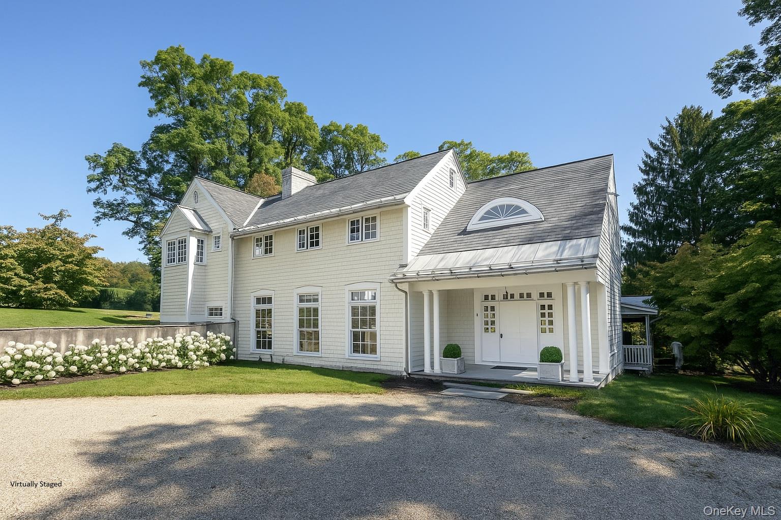 A true country retreat on 109 picturesque acres on one of Millbrookâ€™s most coveted roads, Tower Hill. This extraordinary country estate offers a rare blend of elegance, comfort, and timeless charm. The main residence, originally built in 1909 and remodeled in 2002, features five or six bedrooms, four full bathrooms, and three half bathrooms, designed for both everyday living and grand entertaining. The gracious floor plan is separated into two wings; the west wing features a large entry foyer with a powder room, a living room with a wood burning fireplace, a den or library with wood burning fireplace, and upstairs; a large primary suite with two full bathrooms, a balcony overlooking the courtyard, and an office, dressing room, or additional bedroom. A long central corridor connects the two wings and is flanked by the planted courtyard on one side and a covered porch on the other. The east wing features a formal dining room with a wood burning fireplace, an open kitchen with breakfast room, and a family room with yet another wood burning fireplace. There is also a bedroom with a full bathroom, and a powder room with laundry. Upstairs is an ensuite bedroom with a balcony overlooking the grounds. Perfectly suited for guests or staff, the lower level includes a private bedroom and full bath. A separate two bedroom, 1.5 bath guest house or caretakerâ€™s cottage provides additional accommodations. The propertyâ€™s grounds are equally impressive, with manicured lawns, sweeping meadows, and mature trees. Amenities include a large original barn, pool, private golf hole, and firepitâ€”ideal for both sporting pursuits and relaxed gatherings. Located just 10 minutes from the charming village of Millbrook and the Metro North, this estate offers the best of refined country living with convenient access. A Millbrook classic, perfect as a sporting retreat or a showpiece property with great opportunity to create your own compound, equestrian estate, or sustainable farm. Agriculture and forestry exemptions in place.