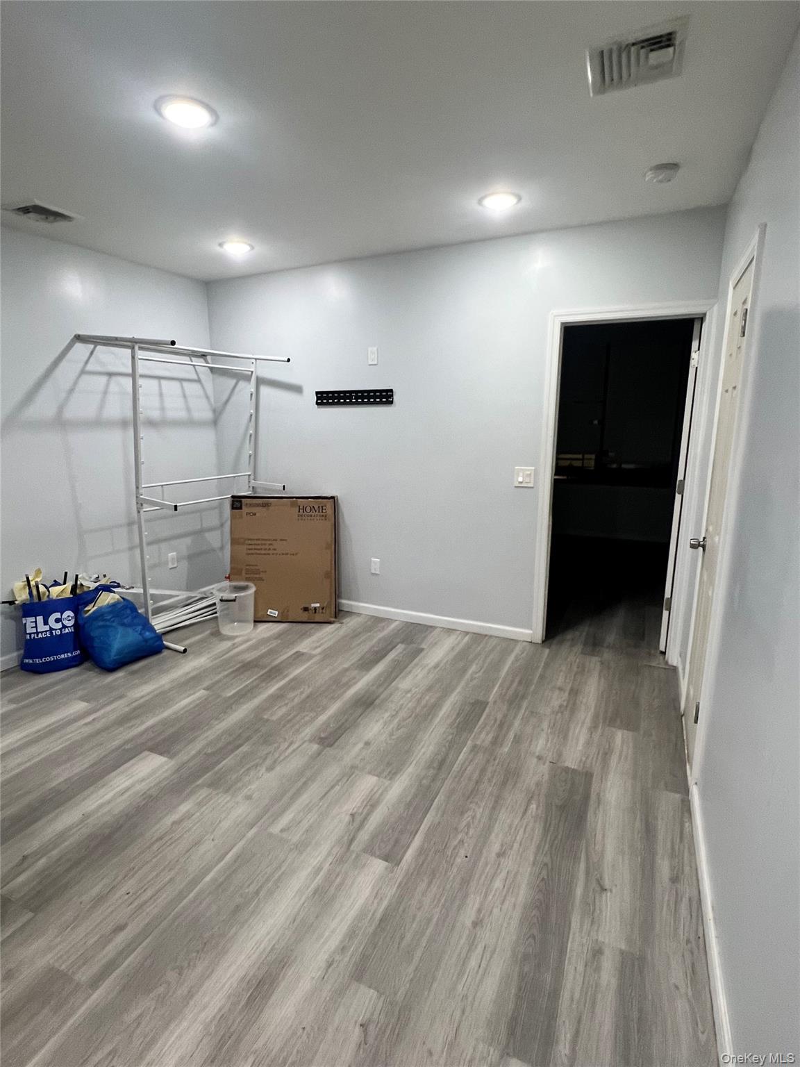 This bright and spacious 2nd-floor apartment features a large bedroom, a generous dining room, an open-concept kitchen, a full bathroom, and two oversized closets. Located above a store in the highly sought-after Queens School District 29, this home enjoys plenty of natural light. The tenant is responsible for electricity and gas, while the owner covers water. Situated in a prime high-traffic location with three-way street exposure, the apartment is directly across from Dunkinâ€™ and just steps away from the LIRR, MTA buses, and major highways, providing exceptional convenience and accessibility.