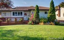 Beautifully updated and spacious 3â€“4 bedroom ranch combining traditional charm with modern style. Features a bright, open living and dining area with dual wood-burning fireplaces, an expanded primary suite with a full bath, and a newly renovated kitchen. Recent upgrades include central A/C, heating system, windows, and sprinkler system. Located in a quiet, friendly neighborhood just minutes from shopping and places of worship, within the desirable East Meadow School District.