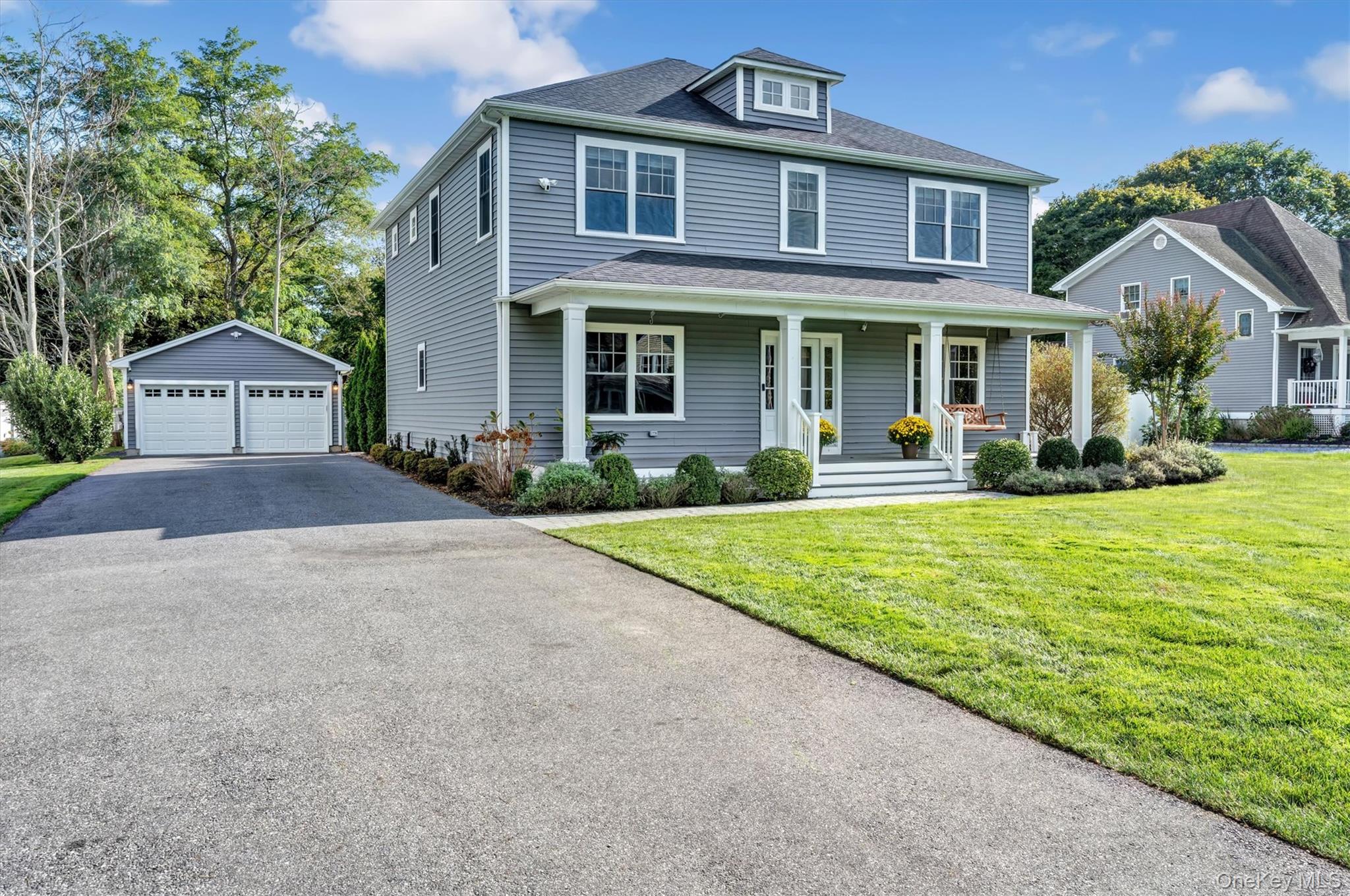 Serenity Meets Sophistication in East Moriches - Discover timeless elegance and modern comfort in this impeccably maintained Colonial home at 14 Culver Lane, East Moriches. Nestled on a pristine .71-acre lot, this 2, 600 sq. ft. residence offers 4 bedrooms and 2.5 beautifully appointed baths. The open-concept floor plan is thoughtfully designed to blend sophisticated style with everyday functionality. At the center of the homeâ€™s effortless elegance&#160;is an oversized chef&rsquo;s kitchen. It boasts stainless steel appliances, luxurious Carrara marble countertops, a large farm sink, and crisp white shaker-style, soft-close cabinets. The kitchen flows seamlessly into the expansive common living area, with an adjacent den/office and a formal dining room featuring decorative ceiling woodwork. All 4 bedrooms are located on the second floor, along with a convenient laundry room and a newly renovated full bath. The large primary suite is a true retreat, appointed with elegant French doors, with 2 separate custom closets, and a spa-like ensuite bath with a double vanity and an expansive walk-in shower. This home showcases upscale craftsmanship throughout, from the custom window treatments and oak hardwood floors to the oversized base moldings. The spacious lower level is ready for your personal touch, with 7&rsquo;10 high ceilings, Energy Star insulation, additional washer/dryer and egress windows. Outdoor living is a dream with the new pool, complete with a water feature wall, sun pad, and a slide for endless fun. The serene, fenced yard also offers multi-zone irrigation, a sun-filled deck, and a stone patio perfect for a firepit. A 2-car, temperature-controlled, detached garage with extra rear storage provides ample space for hobbies or yard equipment. This stunning property offers the perfect blend of luxury and comfort, all while being conveniently close to shopping, transportation, and beautiful local beaches. A recent inspection report is available upon request.