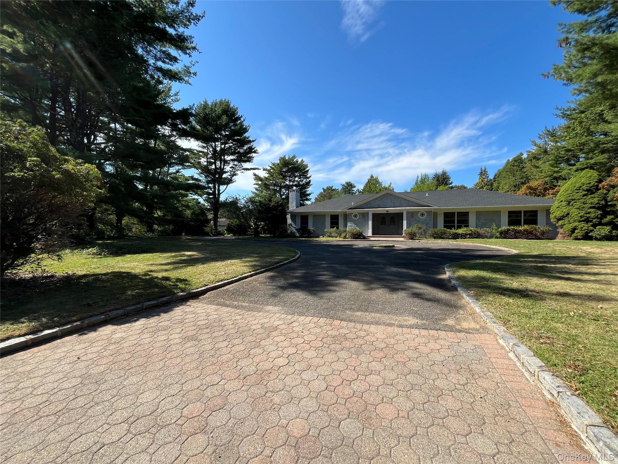 Welcome to this spacious and beautifully updated ranch-style home set on a private country lane in Syosset/Muttontown. This 1-story residence features 3 bedroom suites and total 4.5 baths, including a brand-new master bathroom with a soaking tub. Large windows throughout provide abundant natural light, and the versatile layout includes multiple living areas for both comfort and entertaining.Highlights include a huge library/den with a wet bar, an Eat-in-kitchen,  ample storage, and a full basement. Set on 2 flat acres, the property offers exceptional privacy and a vast backyard for relaxation or gatherings.Conveniently located near shopping, dining, golf courses, parks, and transportation, Syosset School District.Key Details:Monthly Rent: $6, 500Lease Term: 1 year+Owner pays waterTenant responsible for landscaping, cable, internet, electricity, and heating fuel (oil)Pets: dogs and cats allowed.A rare rental opportunity that offers privacy, space, and convenience in one of Muttontownâ€™s most desirable locations.