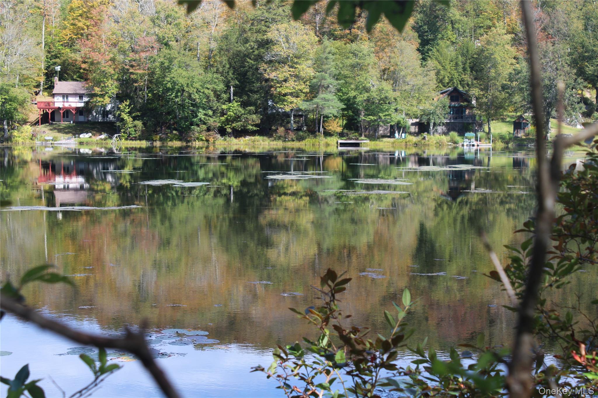 Live the Lake Life You Deserve â€“ Lake Muskoday, NY This is not your average lake listing â€” itâ€™s a rare double-lot opportunity in the peaceful, private community of Lake Muskoday, just 2.5 hours from NYC.Build your dream getaway (or future forever home) on a gently sloping lot â€” and enjoy your own lakefront lot directly across the street. Yes, your own waterfront for morning coffee, sunsets, or launching your kayak.A previously engineered site plan and approved septic system are already in place â€” just needs updating. Translation? Youâ€™re ahead of the game. Why Lake Muskoday?This 54-acre gem is ideal for fishing, paddling, and non-motorized boating â€” so it stays peaceful and pristine. Plus, when you buy here, you have the option to join the Lake Association, which comes with: A private sandy beach (yep, your own local beach) Pavilion + picnic area for chill weekends or friend gatherings Access to 200+ acres of private land for hiking, exploring, or just disconnecting Bonus: Association shares are $1, 500 (refundable when you leave) and dues are a very doable -$300/year.
