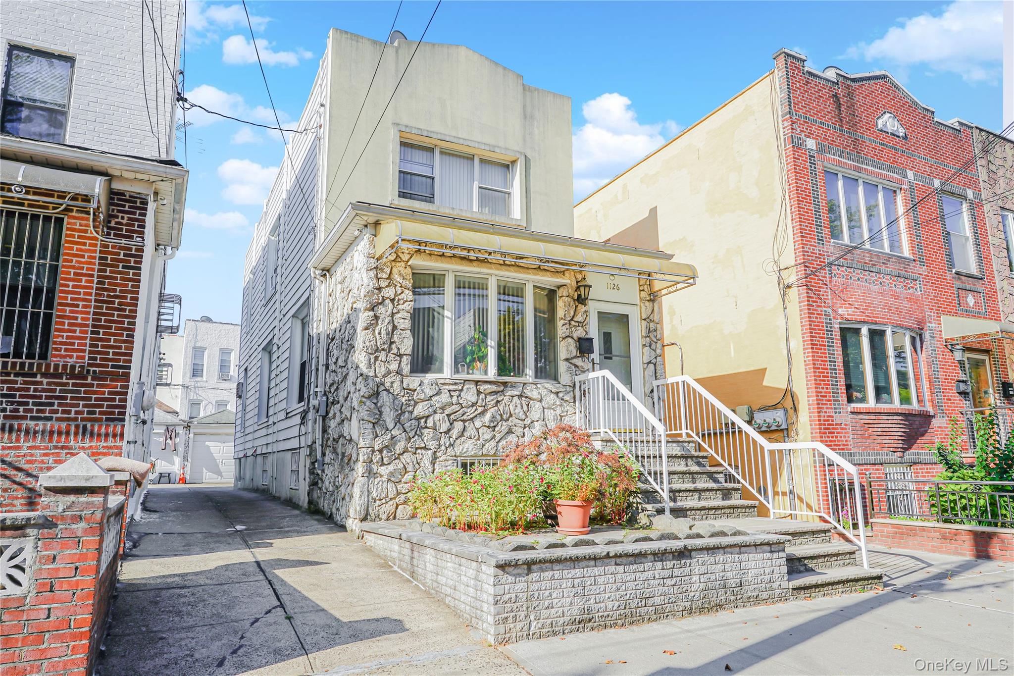 This well-maintained detached single-family brick home in Dyker Heights features 3 bedrooms and 3 baths. Sun-drenched rooms with hardwood floors create a warm and inviting atmosphere, complemented by a modern kitchen and split unit heating/cooling for year-round comfort. The fully finished basement provides additional versatile family room space, while the backyard boasts a patio, detached garage, and extra parking. A rare find in a sought-after neighborhood, this property combines charm, functionality, and convenience.