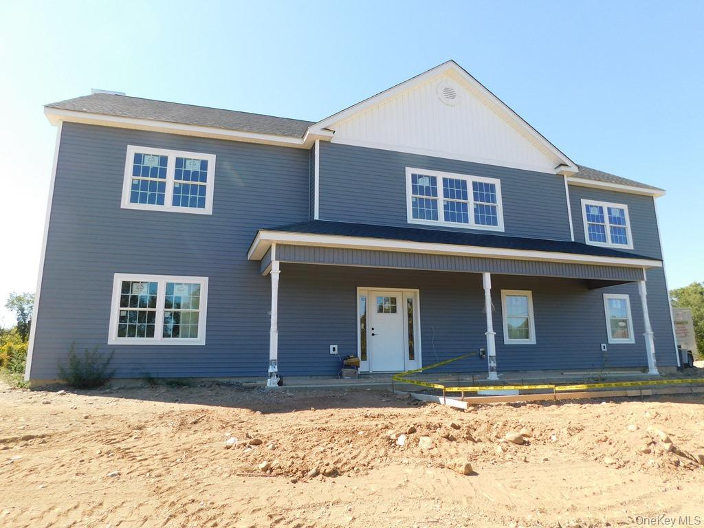 This 2573 sq.ft. Colonial Bilevel with 4 bedrooms and 3 full baths is the last home left. Vaulted high ceilings with open floor plan. Plan includes kitchen with 6&rsquo; island with quartz countertop, sliders lead to a 14 x 14 Fiberon maintenance free deck off the dining room/kitchen area. Kitchen appliances are included. Primary bedroom with walk in closet and gorgeous bathroom with double vanity and fully tiled shower. First floor features a fireplace in the large family room, bedroom, full bath, laundry room and 2 car garage. There are hardwood floors throughout the home, tile in all bathrooms and laundry. Property is just over 2 acres with Wallkill Schools!