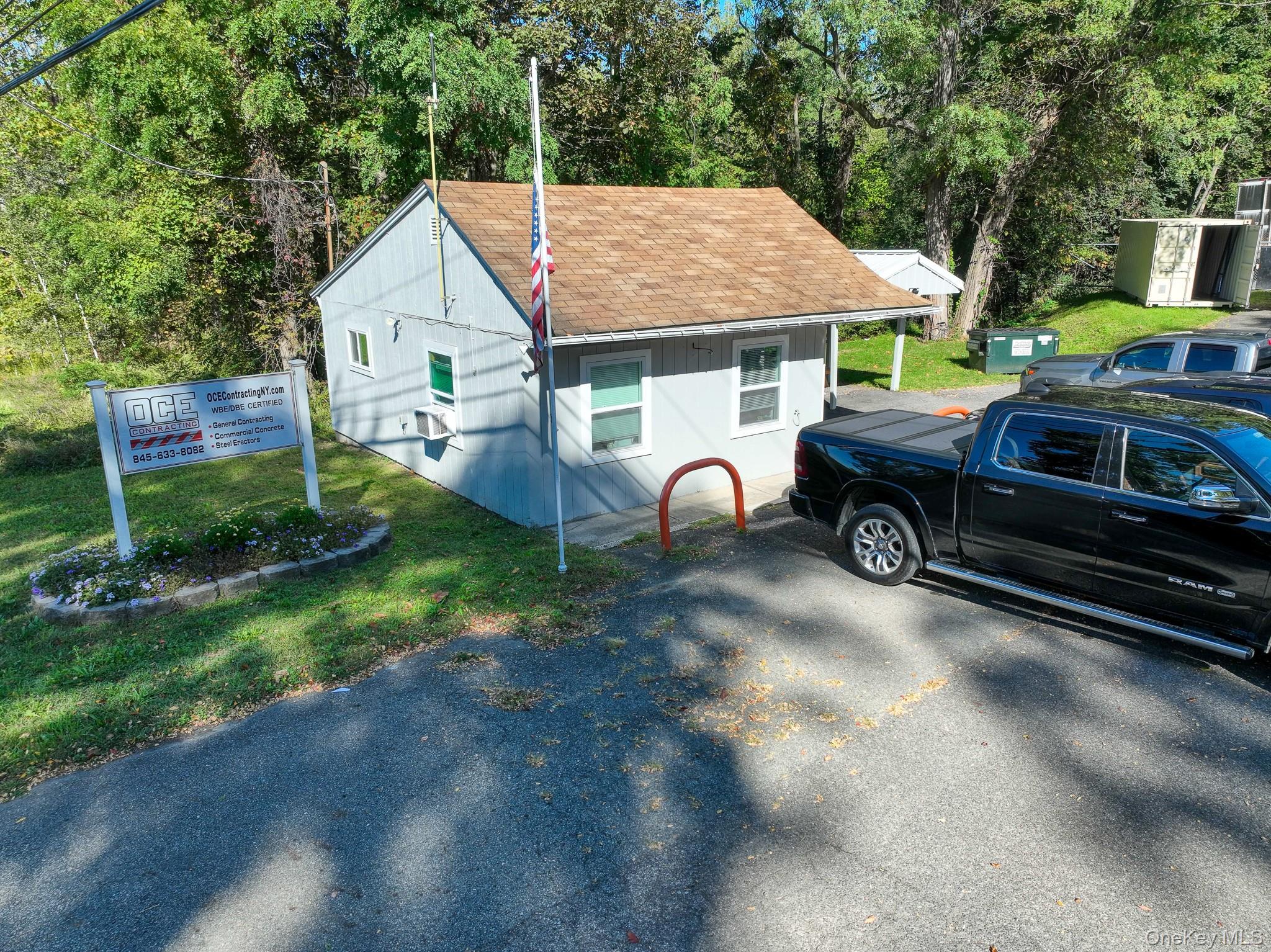 Donâ€™t miss this unique opportunity to own a versatile and well-maintained commercial property located directly on highly traveled Route 300 in the sought-after area of Wallkill, NY. Featuring excellent road frontage, a paved parking lot, and a variety of usable structures on a spacious 32, 000 sq ft lot (0.73 acres), this property has exceptional potential for a wide range of commercial, contractor, service-based, or mixed-use applications.The main structure includes a 216 sq ft office building, ideal for administrative, client-facing, or operational functions. Included on the lot is a very large garageâ€”perfect for storage, workshop space, fleet vehicles, equipment housing, or trades-based use such as plumbing, electrical, landscaping, or general contracting. The garageâ€™s size and layout allow for flexibility in usage and can easily accommodate different types of operations.In addition to the primary buildings, the property also features a fenced-in backyard, adding security and usability for storage of materials, machinery, or additional parking. The well-maintained lot presents a clean and professional appearance, enhancing curb appeal and making it ready for immediate occupancy or operation with minimal improvements needed. The propertyâ€™s location on Route 300 provides high visibility and easy access to major highways, surrounding towns, and commercial corridors, making it ideal for businesses that benefit from daily drive-by traffic and logistical convenience. The surrounding area includes a mix of residential neighborhoods, small businesses, and commercial operations, supporting a wide customer base and potential workforce.Whether youâ€™re an investor, small business owner, or service provider looking to establish a presence in a growing area of Ulster County, this property offers both the space and flexibility to meet your operational needs now and into the future. With its existing infrastructure, secure lot, and adaptable buildings, this is a rare chance to acquire a functional and well-located commercial property in a highly visible, high-demand location. Bring your vision and make this site work for your business.