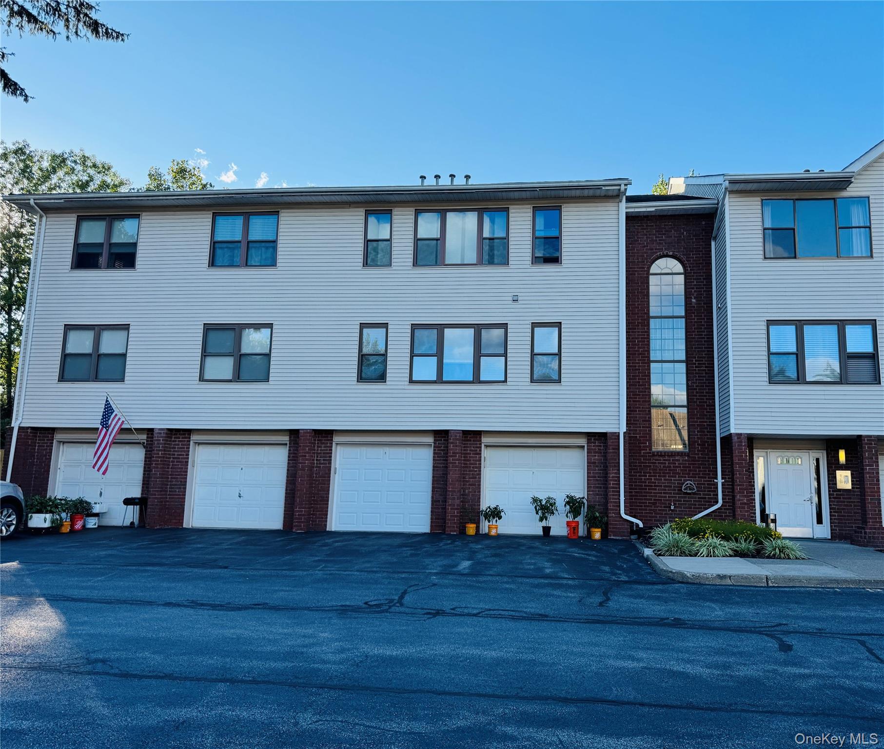 Motivated seller. This corner penthouse suite is move-in ready and located in Middletown School District. The kitchen has newer appliances, a new microwave, a pantry and plenty of storage cabinets. With an open concept Livingroom and Dining Room with a wall mounted TV, this suite provides ample room for family gatherings, relaxing and entertainment. The main bedroom boasts a large walk-in closet and en-suite. The second bedroom and a laundry/utility room is conveniently located down the hall. This home is beautifully trimmed with two tone paint resembling wainscoting walls throughout. It offers new vinyl flooring in the Kitchen, a new hot water heater, new vinyl windows, a new air conditioning unit, new washer and drier and custom blinds. The 3-car stacked garage with a versatile 12x12 area perfect for storage, hobbies, or a workshop. It is just a short distance to the clubhouse, pool and tennis court where you can enjoy the amenities of the complex. Conveniently located near shops, restaurants, schools, and parks. A commuter&rsquo;s dream location, within minutes to the train, bus and major highways.