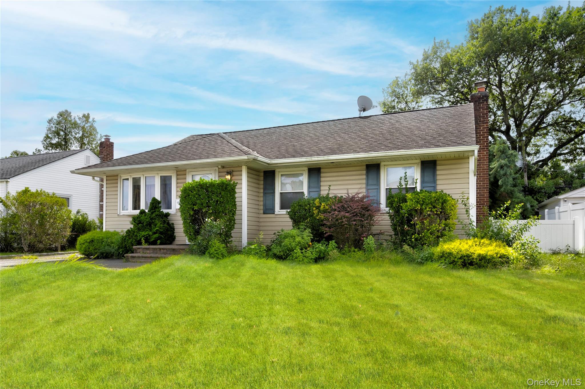 Charming Plainview ranch with full finished basement! Set on 5, 800-sf lot with mature trees, fenced yard, and room for a swing set or vegetable garden. Updated mechanicals, public water/sewer, and low maintenance vinyl siding. Close to top rated Plainview Old Bethpage schools, minutes to LIRR Hicksville station, Northern State & Southern State parkways, and every shopping/dining option along Old Country Road. Move in ready, flexible layout, and ready for a new owner.