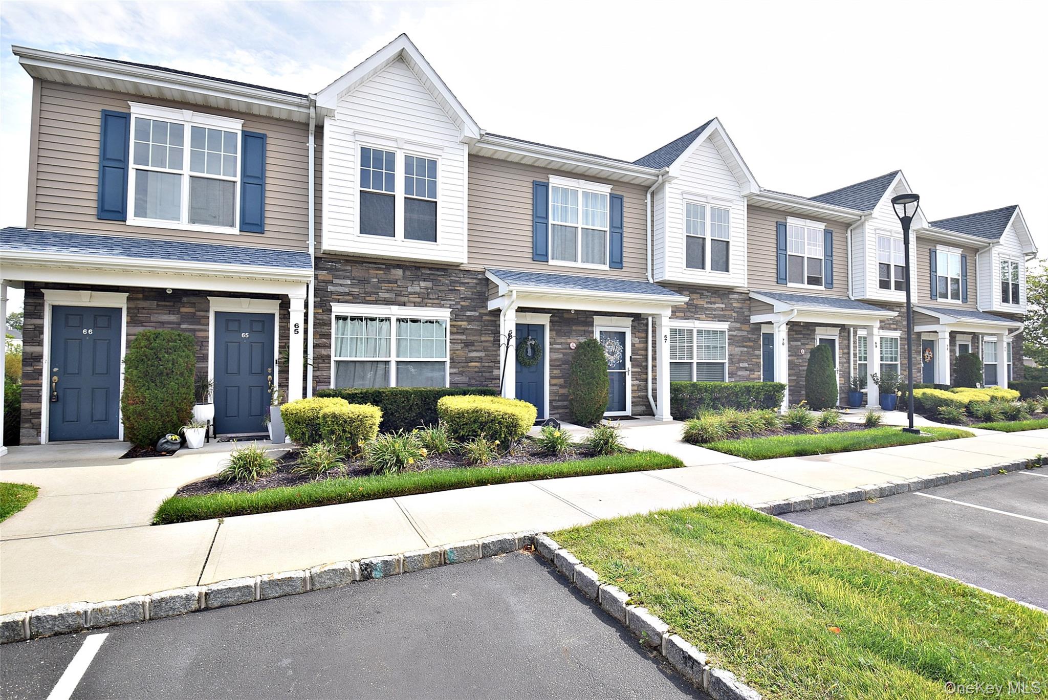 Welcome to a hidden gem nestled in a gated community. This second floor walk up condo has been renovated with modern flooring and fixtures. The open space living room has a high ceiling, the master suite and second bedroom are on the same level and there is a walk up loft. The grounds are impeccable and the balcony overlooks a serene pond. Don&rsquo;t miss this move-in ready oasis!