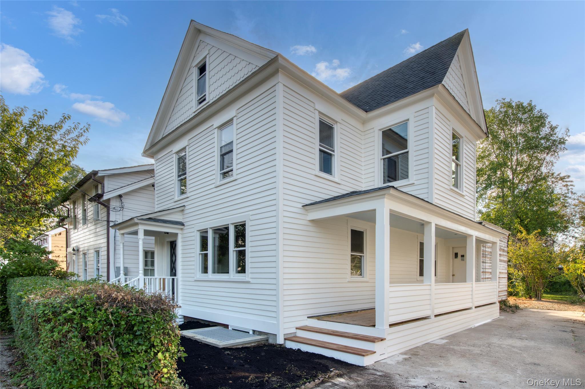 Exceptional opportunity in Greenport Village! Nestled in a location that perfectly balances convenience and charm, this 3-bedroom, 2-bathroom home on a 5, 227 square foot lot offers an enticing proposition. With approved plans already in place, envision transforming this residence into a 3-bedroom, 2.5-bath layout, enhancing both its functionality and appeal. Situated just a block from the water and two blocks from the lively town center, 151 Central Avenue promises an unparalleled lifestyle. Recent renovations have meticulously restored the original clapboard siding, while the addition of new front and side porches beautifully complements the home&rsquo;s classic architecture. Inside, the residence awaits your personal touch, with structural work completed to pave the way for your dream design. The home features an unfinished basement with the original stonework foundation, showcasing an egress window that invites natural light and offers further development potential. This space can be transformed into a cozy retreat, a functional workshop, or any other space that fits your needs.  This property represents a rare investment opportunity in a highly desirable area. Embrace the chance to complete the transformation of this classic residence, customizing it to reflect your personal style while maintaining its historic charm. Discover the potential of living in the heart of Greenport Village, where every day brings the promise of coastal beauty and vibrant community life.