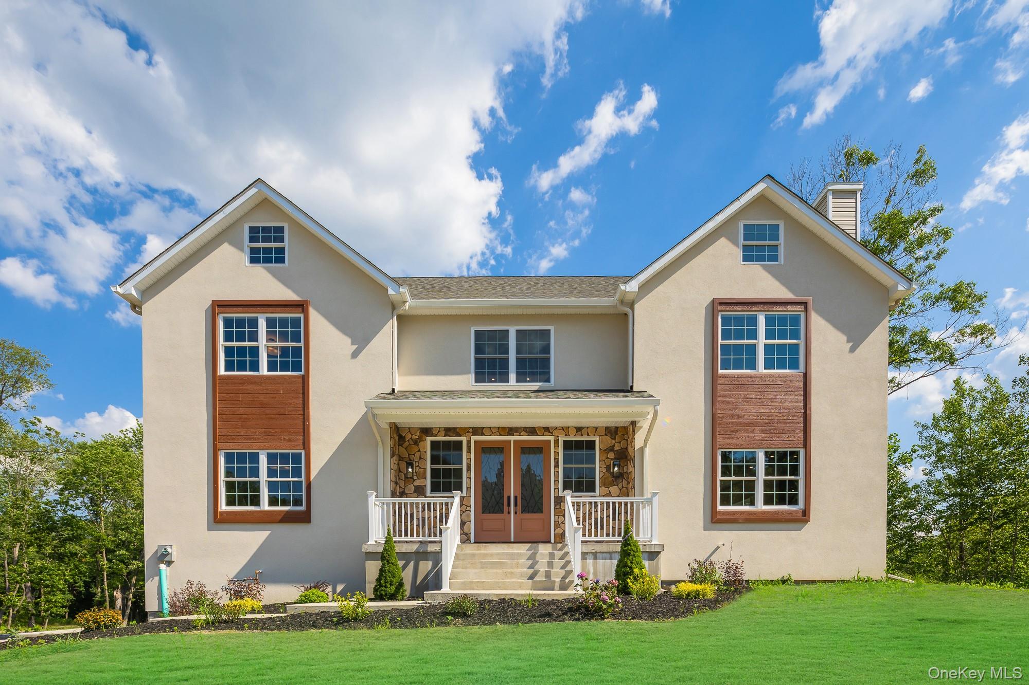Discover a luxurious brand new home, nestled on a private and quiet cul-de-sac. This home is the first in a series of eight exclusive residences, offering over 3, 000 square feet of elegant living space on a sprawling one-acre lot. As you are embraced in the elegance and warmth of the entrance foyer, notice the open floor plan that creates a spacious and airy atmosphere and offers an abundance of natural light flowing through the space. The State-of-the-Art Kitchen is a chef&rsquo;s dream, equipped with sleek quartz countertops, a center island with seating, and high-end stainless steel appliances. Bright LED lights under the cabinets add a sophisticated touch to the ambiance. The roomy dinette area, leads out to a huge private deck, perfect for entertaining or enjoying quiet evenings. Adjacent to the kitchen, the Dining and Living Areas boast a grand wood-look burning fireplace, creating a warm and inviting setting. An Additional Room on this level offers versatility, ideal for an office, study, or playroom, complemented by a stylish Half Bath with a modern vanity. Moving to the second level, we enter the Master Suite, a haven of luxury with high ceilings, LED lighting, and another grand wood-look burning fireplace. The master bath is a retreat in itself, featuring a contemporary marble design, a freestanding soaking tub, a glass-enclosed jetted shower, and dual vanities with anti-fog mirrors illuminated by multicolor LED lights. Two spacious walk-in closets offer ample storage space. There are three Additional Bedrooms, each generously sized with closets and large windows, all featuring the same exquisite Red Oakwood floors. The Hallway Full Bath is beautifully designed for both functionality and style. Lastly, the well-appointed Laundry Room comes with cabinets and quartz countertops, adding convenience to your daily routine. The Attic provides ample storage space, enhanced by spray foam insulation and natural light. The Basement includes a two-door garage and more than 1, 000 sq ft of unfinished space with large windows, offering endless possibilities for customization. This exceptional home combines modern living with a tranquil setting, making it an ideal choice for those seeking a private retreat.