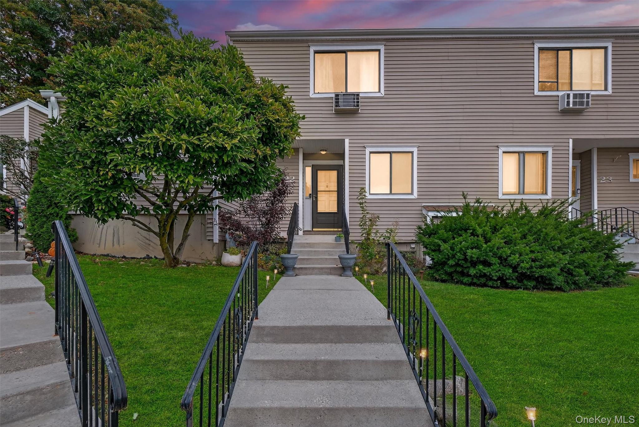Welcome to this spacious townhome located in the desirable Brewster Woods complex. This tri-level home features 2-bedrooms, 1.5-bathrooms and a den that may be used as a home office or a third bedroom. The open-concept main living area includes an updated eat-in kitchen with stainless steel appliances and an abundance of cabinets. The kitchen flows seamlessly into a large dining area and living room with sliders to the backyard. Upstairs,  you&rsquo;ll find a large primary bedroom that offers spectacular views and a huge walk-in closet. An updated full bathroom, good-sized office/den and an additional bedroom complete the second level. The full basement has high ceilings and provides the potential for an additional 600 square feet of living space. Additional features include beautiful hardwood floors and two assigned parking spots in front of the unit.  Convenient location, just off of I-684 and close to Brewster or Southeast train. Close proximity to shopping, restaurants and schools.
