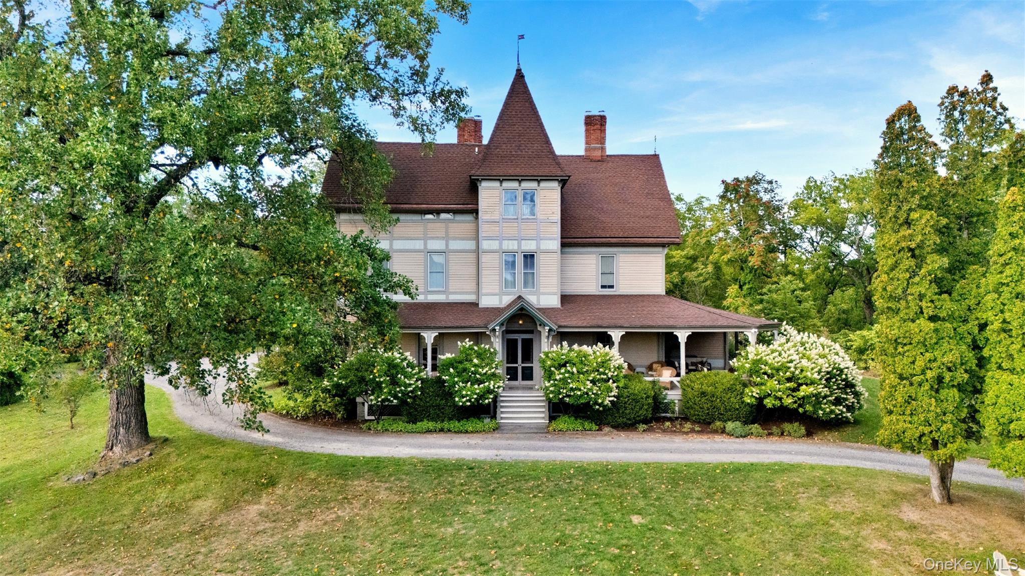 Mountain views, historic charm, hiking trails and 100 private acres, just minutes to everything Hudson....what&rsquo;s not to love. Say hello to your new Hudson Valley venture. As you pull up the winding tree-lined drive its like entering another world; serene and welcoming. The grand estate slowly comes into view. A stately Manor house sits on a lush hilltop, a three bedroom cottage nestled along the way and a 5, 600 sf multipurpose barn adds to the appeal. Originally built for the friend of famed Hudson River artist Frederic Church, this gracious Eastlake Victorian, illustrates the streamlined beauty of clean lines and good bones. Stroll through her light-filled rooms to discover this spacious Manor house has been thoughtfully transformed into a 7 Bedroom, 8 Bathroom hospitality venue. An elegant wraparound veranda, seven fireplaces, period turret, and original architectural details have been preserved with a host of upgrades suited for this century. Nestled in the heart of the Hudson Valley, which offers four season fun, peace and tranquility, this prime location takes advantage of all the region has to offer. This pin point perfect location is easily accessible by train, plane and automobile. The property is equally suited for a multi-generational family compound or commercial venture, with endless possibilities that include: a wedding venue, art center, wellness retreat, tiny homes and residential development, just to name a few. Currently established as a hospitality venue with ADA compliance, required safety features and without restrictive zoning, this property offers extraordinary flexibility with potential for growth. Travel and Leisure recently featured a photo of this property to showcase the amazing Catskill Mountain views of Hudson, stating, &rsquo;&rsquo;According to the travel experts we spoke to, there&rsquo;s no better spot for a breezy getaway than Hudson, New York.&rsquo;&rsquo; www.travelandleisure.com/travel-experts-picked-favorite-nyc-getawayhudson-11795774 More than just another listed property - it&rsquo;s a rare opportunity to own a piece of Hudson Valley history with unlimited potential for your future.