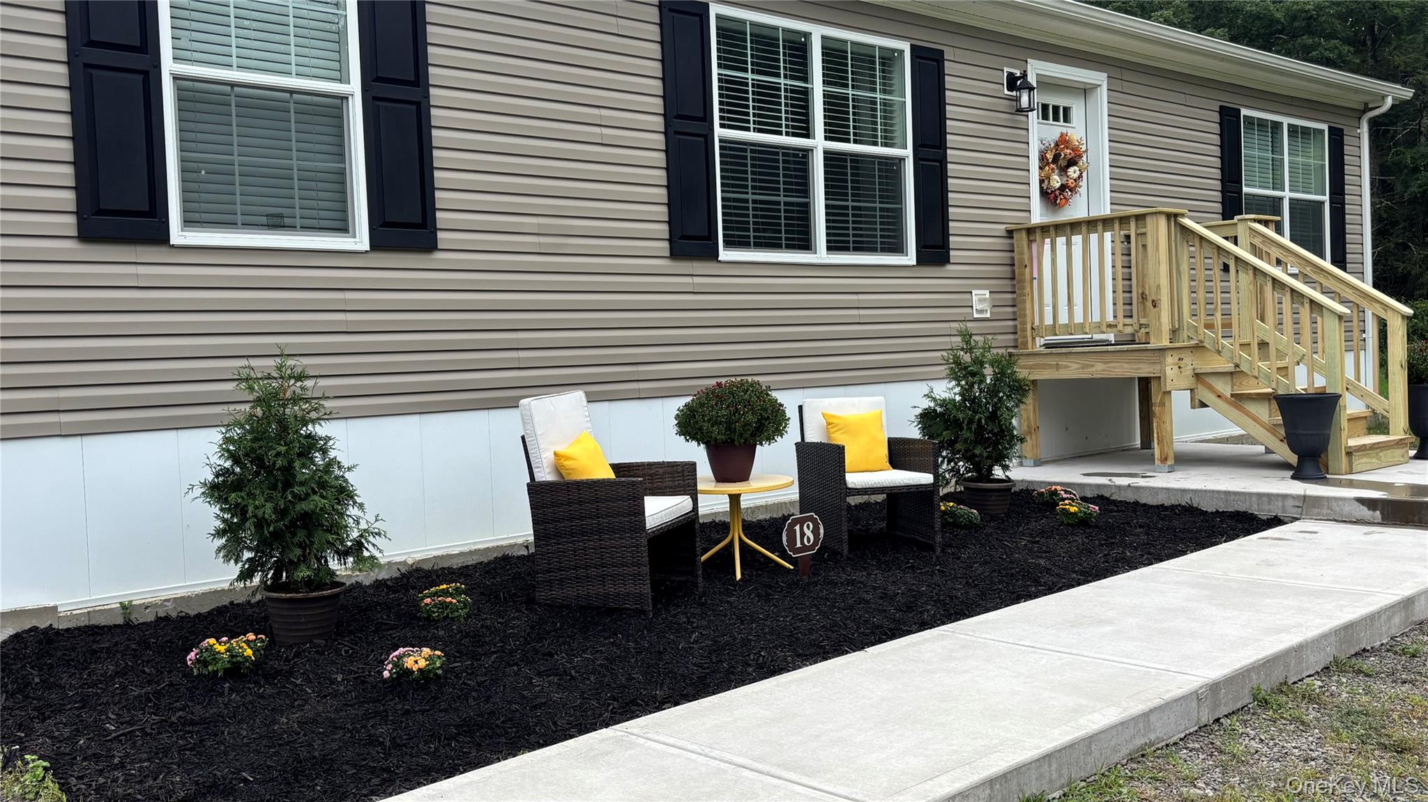 Welcome to Ruby Road, a modern and bright newly built home in an easy living upscale community. The first home in the park, located on a double lot with room for outdoor living. Walk into an open floor plan with large living area, massive kitchen with large island for entertaining and cooking meals. Dining area and laundry room. Primary bedroom on one side of the house with ensuite bath, and large walk in closet. On the other side are two good sized guest bedrooms and full guest bath with tub. Outside there is plenty of room for your dog to play or relaxing in the Hudson Valley sun. New barn for ample outdoor storage. Lot fee includes all taxes, garbage, water, plowing and park maintenance. 5 minutes to Kingston and 10 minutes to Woodstock for all the best restaurants, shoppes, hiking, and hobbies. Quiet and peaceful, this brand new home is an exceptional deal in a lovely location.