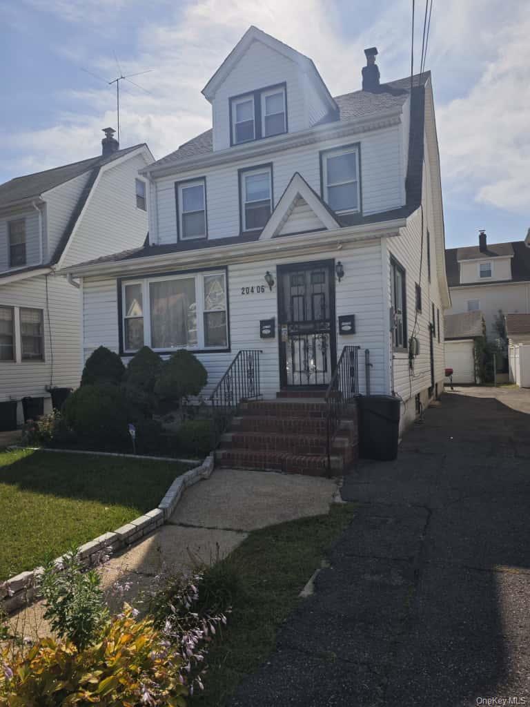 This detached Colonial-style home with a classic two-and-a-half story layout offers a long private driveway, a brick-step entry, and plenty of natural light throughout. Inside, youâ€™ll find a traditional living room with a brick fireplace and French doors leading to a formal dining room, an eat-in kitchen with a separate breakfast area, multiple comfortable bedrooms, a finished attic space that works well as an office or studio, and both a full and half bath. The property is being sold strictly as-is, giving the next owner an excellent opportunity to update and customize it to their own taste.