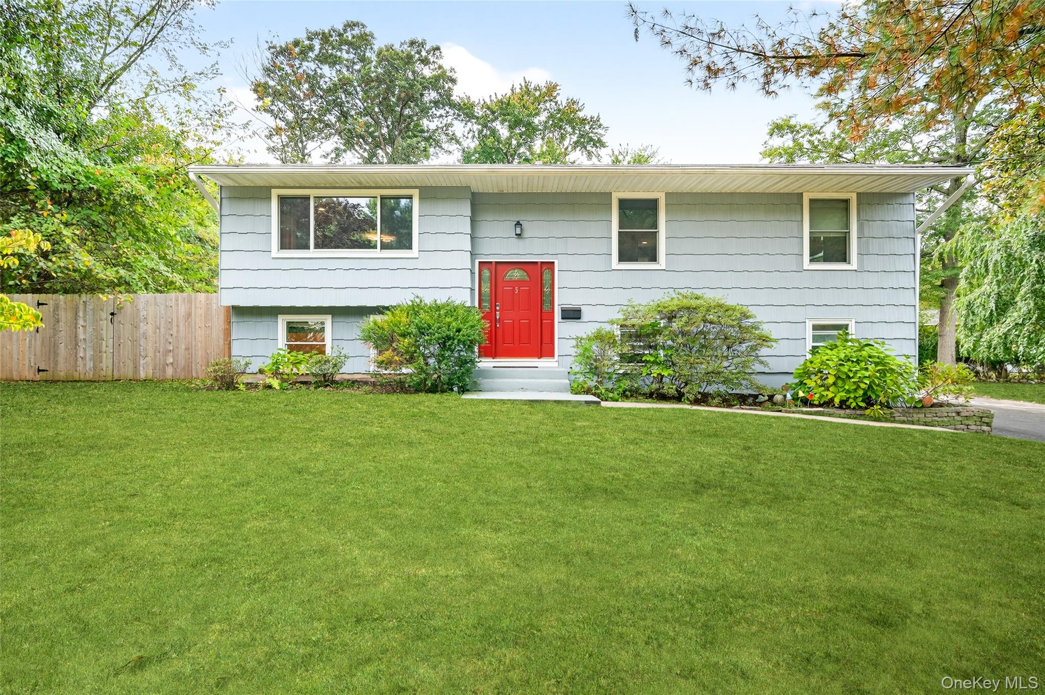 Welcome Home to Blauvelt, NY!This 4-bedroom, 3-bathroom home combines comfort, convenience, and space in a prime commuter locationâ€”just 30 minutes to NYC and less than 5 minutes from the Palisades Parkway. Recently renovated, it features a modern open concept kitchen with quality finishes & stainless appliances, beautiful hardwood floors throughout, and a functional layout designed for everyday living. The dining room opens to a spacious 3-season sunroom overlooking the backyard, perfect for family gatherings and entertaining. Outside, enjoy an above-ground pool and a fully fenced rear yard, offering both privacy and fun outdoor living. Additional highlights include: Attached 2-car garage with plenty of parking, nearly half an acre of property in a sought-after neighborhood all within Award winning South Orangetown School district. This move-in ready Blauvelt home is the ideal blend of suburban charm and commuter convenience. Schedule your private tour today!