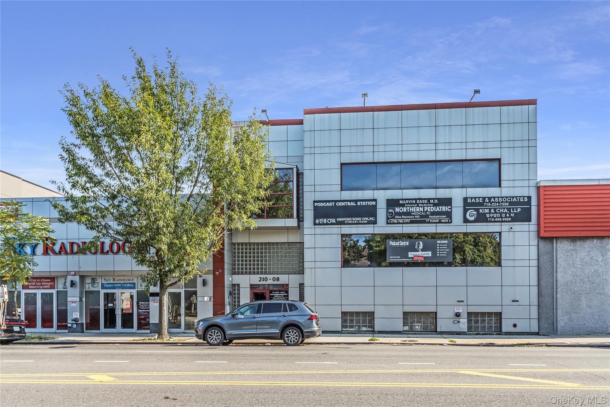Rarely available package deal featuring three modern construction commercial office buildings with a combined 100 feet of prime frontage along Northern Boulevard in the heart of Bayside. The properties included are 210-12 Northern Blvd, 210-08 Northern Blvd, and 209-45 45th Road, all well-maintained and constructed between 1999 and 2015. Together, they represent a unique chance to secure a premier portfolio in one of Queensâ€™ most desirable commercial corridors. This offering includes 11 total units, with 9 currently leased to a mix of professional and medical office tenants, generating stable income. Currently at a healthy 5.3% cap rate, this is an excellent fit for investors seeking reliable cash flow. In addition, the buildings are designed with modern layouts, professional finishes, and efficient systems, ensuring long-term tenant satisfaction and minimal maintenance concerns. Two of the Northern Blvd buildings are elevator-equipped, enhancing accessibility and appeal to a wide range of office and medical users. Another standout feature is the secure underground garage with 17 parking spaces. In a market where parking is limited, this amenity adds significant value for both tenants and visitors. The portfolioâ€™s location further amplifies its appeal â€” positioned on heavily trafficked Northern Boulevard and situated less than a half mile from the Bayside LIRR station, the properties benefit from outstanding visibility, commuter convenience, and accessibility to Manhattan and Long Island. Beyond stabilized income, there is built-in upside potential. The largest two-floor unit, located in what is commonly referred to as the â€œRadiology Building, â€ will become available in November 2025, offering an end-user or anchor tenant the opportunity to establish a flagship presence in a prime Queens location. This unique combination of stable returns, modern construction, strong tenant mix, and a forthcoming marquee vacancy makes this portfolio an exceptional long-term investment. Whether you are an investor looking for a well-performing portfolio or an end-user seeking a highly visible Northern Blvd address, this three-building package is an extraordinary opportunity in Bayside. Floor plan and photos for 209-45 45th Rd coming soon!